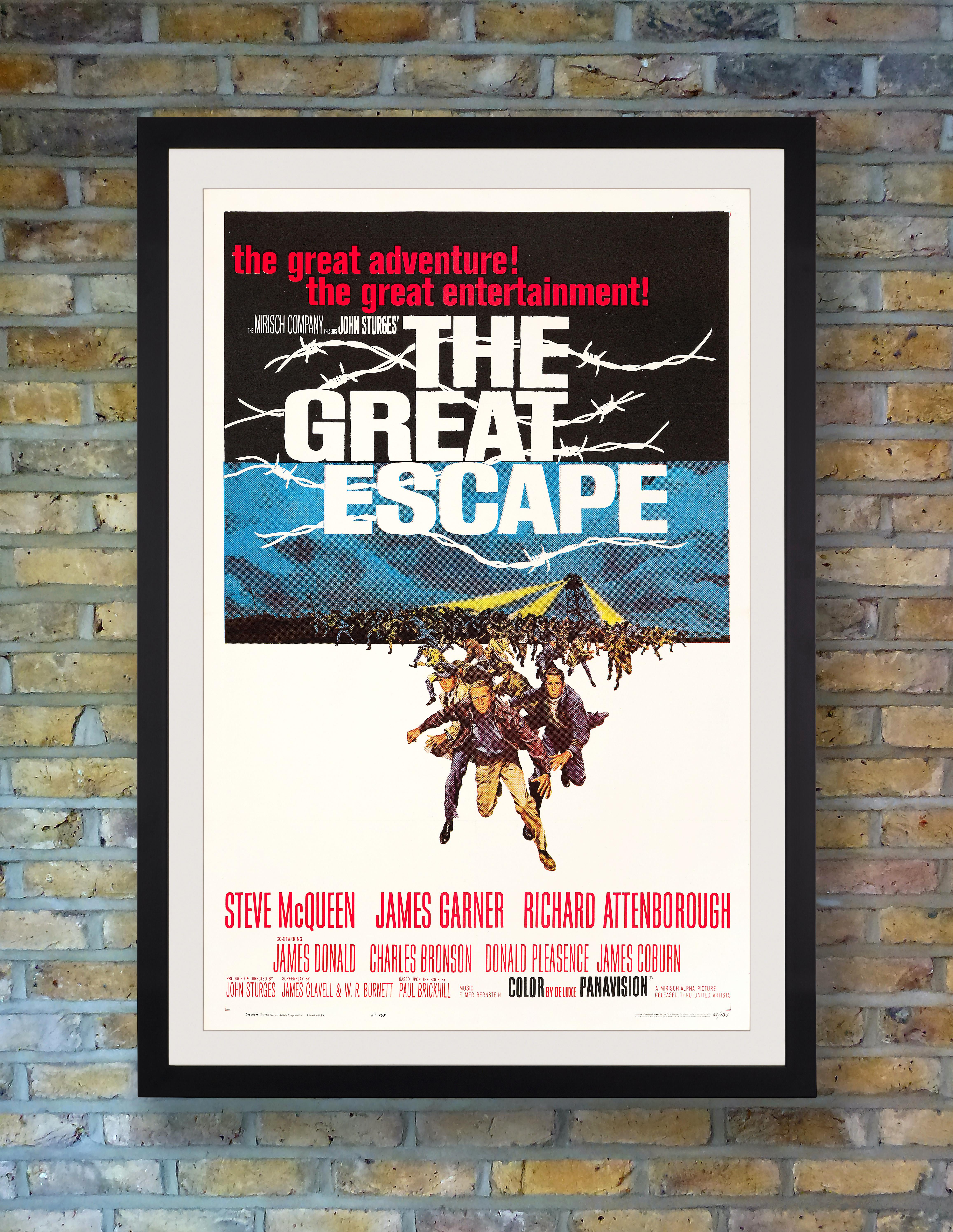 Best known for his action packed James Bond posters, American artist Frank McCarthy's dynamic design for John Sturges' spectacular 1963 wartime adventure 'The Great Escape' features king of cool Steve McQueen front and centre, leading co-stars James