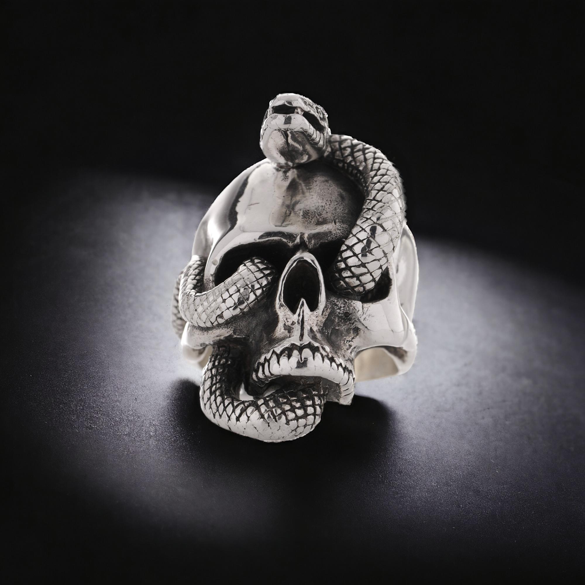 The Great Frog men's sterling silver Nāgá skull ring. 
Made in the United Kingdom, London, 2021 
Maker: The Great Frog 
Fully Hallmarked with English hallmarks. 

In Hinduism, the Nāgá, Sanskrit for Cobra, is revered as a nature spirit and guardian