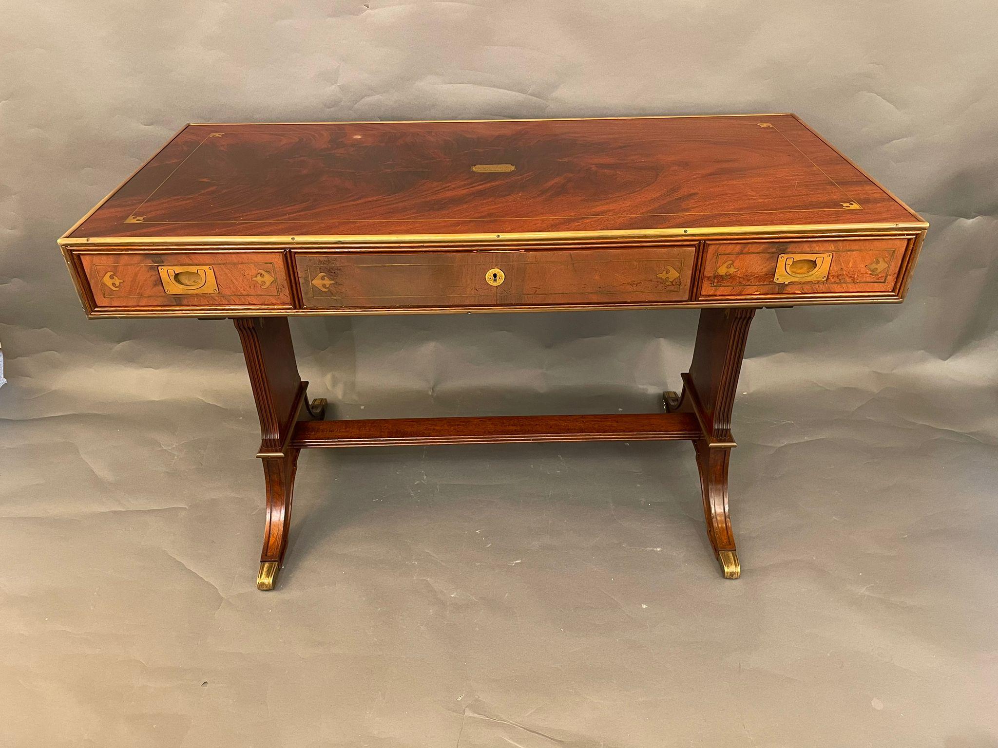 A Mid 20th century captain's desk. Marked with a plaque on the top, 
