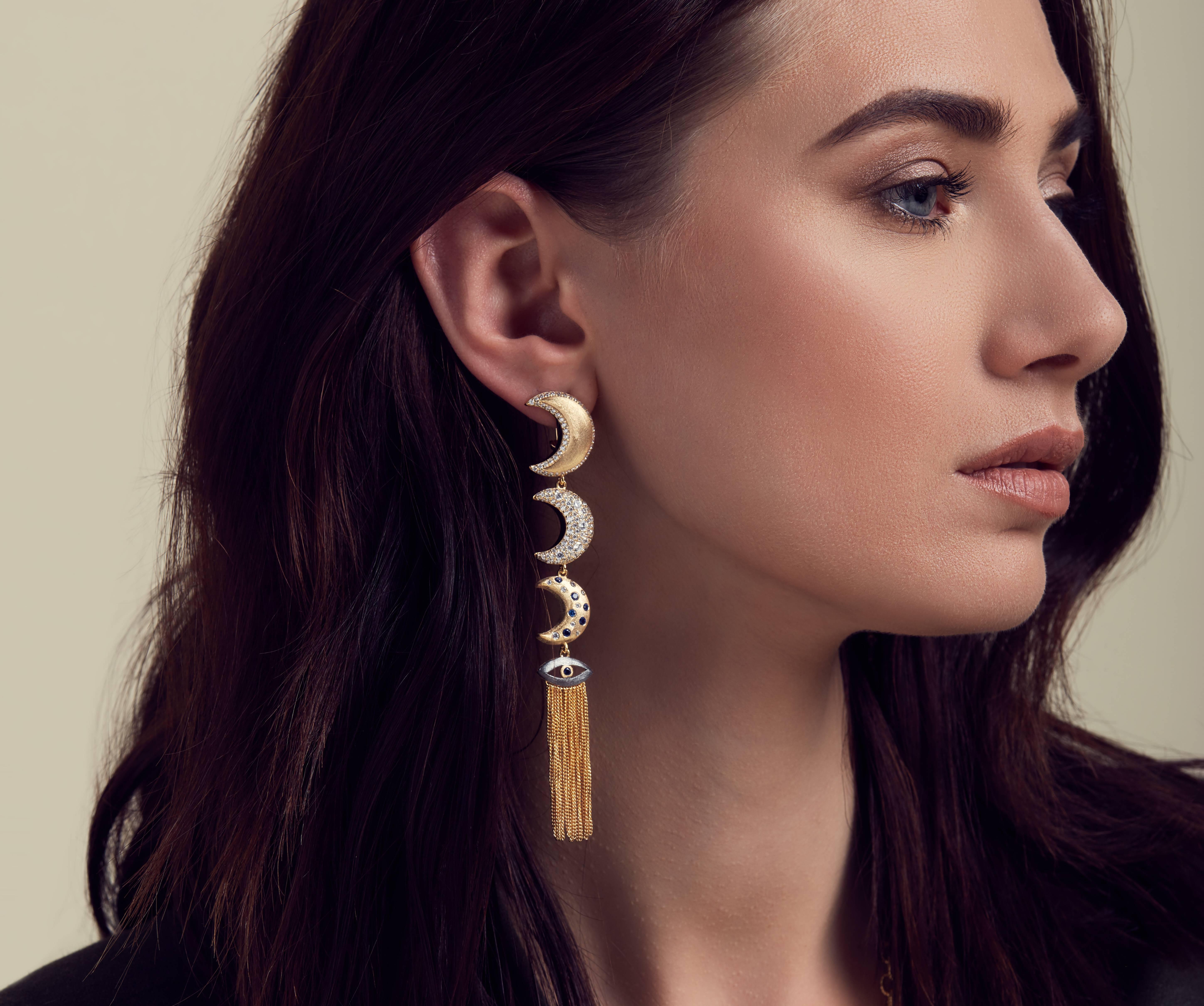 Part of our Sa'mma= Sky Collection. Inspired by the sky, the universal blanket that covers mankind and unifies us all under its protective wings. The Guardian Moon linear earrings are hand crafted  w/ lever back closure for more comfortable fit.