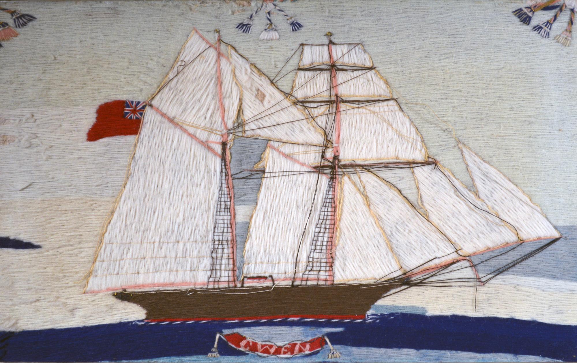 British Sailor's Woolwork or Woolie,
The Gwen,
Circa 1875

The small British sailor's woolie depicts a starboard view of the brigantine Gwen sailing on a calm blue sea and flying a red ensign. The ship is named on a red banner below with a sewn