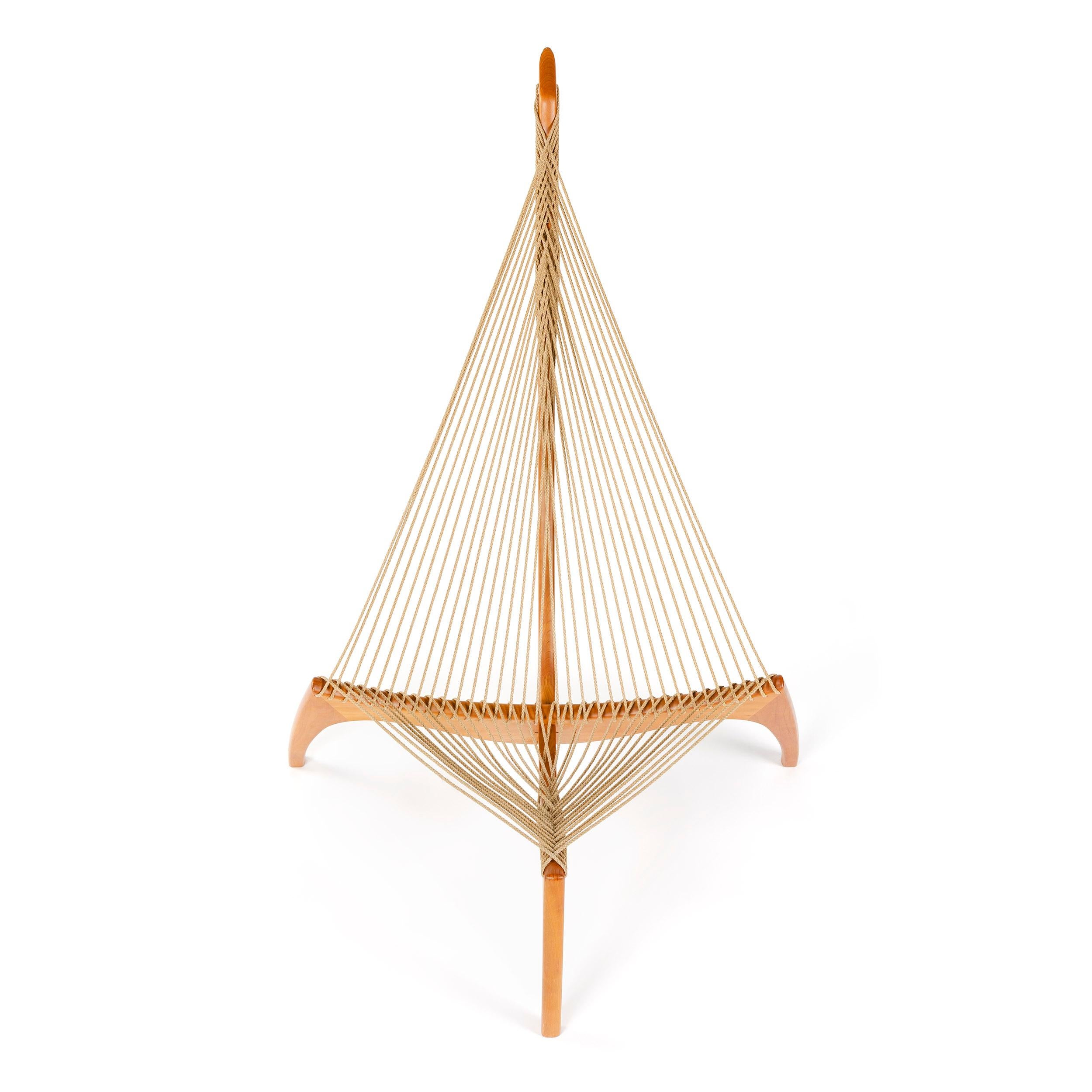 A cherrywood lounge chair designed by Jorgen Hovelskovs with woven hawser string for upholstery. Produced by Christensen and Larsen in Denmark in the 1960s.
