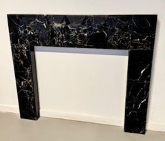 The Harrison: A Modern Stone Fireplace with a Faceted Facade