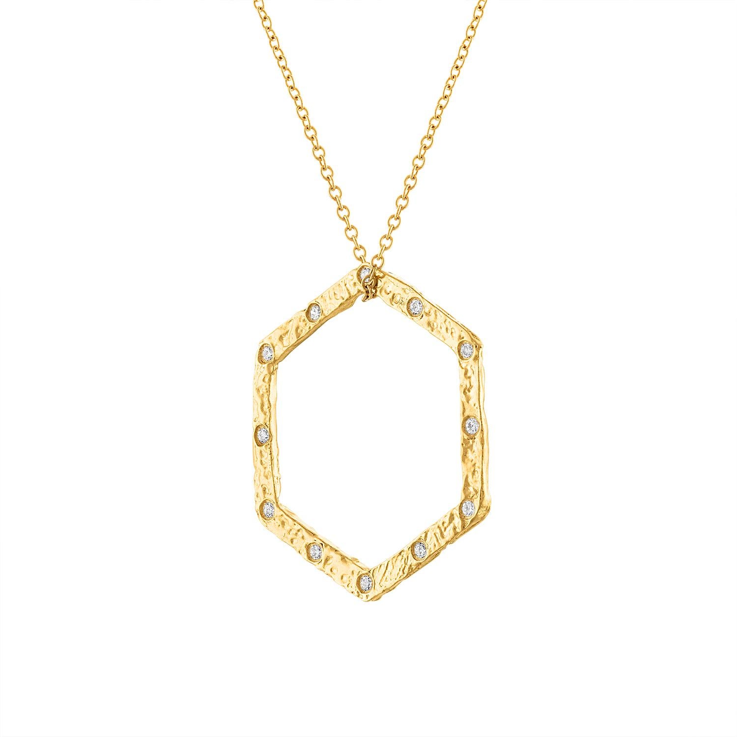 This diamond Hexagon Necklace is a stunning piece that combines modern design with timeless elegance. The necklace features a Hexagon adorned with diamonds scattered throughout creating a look that is both eye catching and sophisticated. Unique with