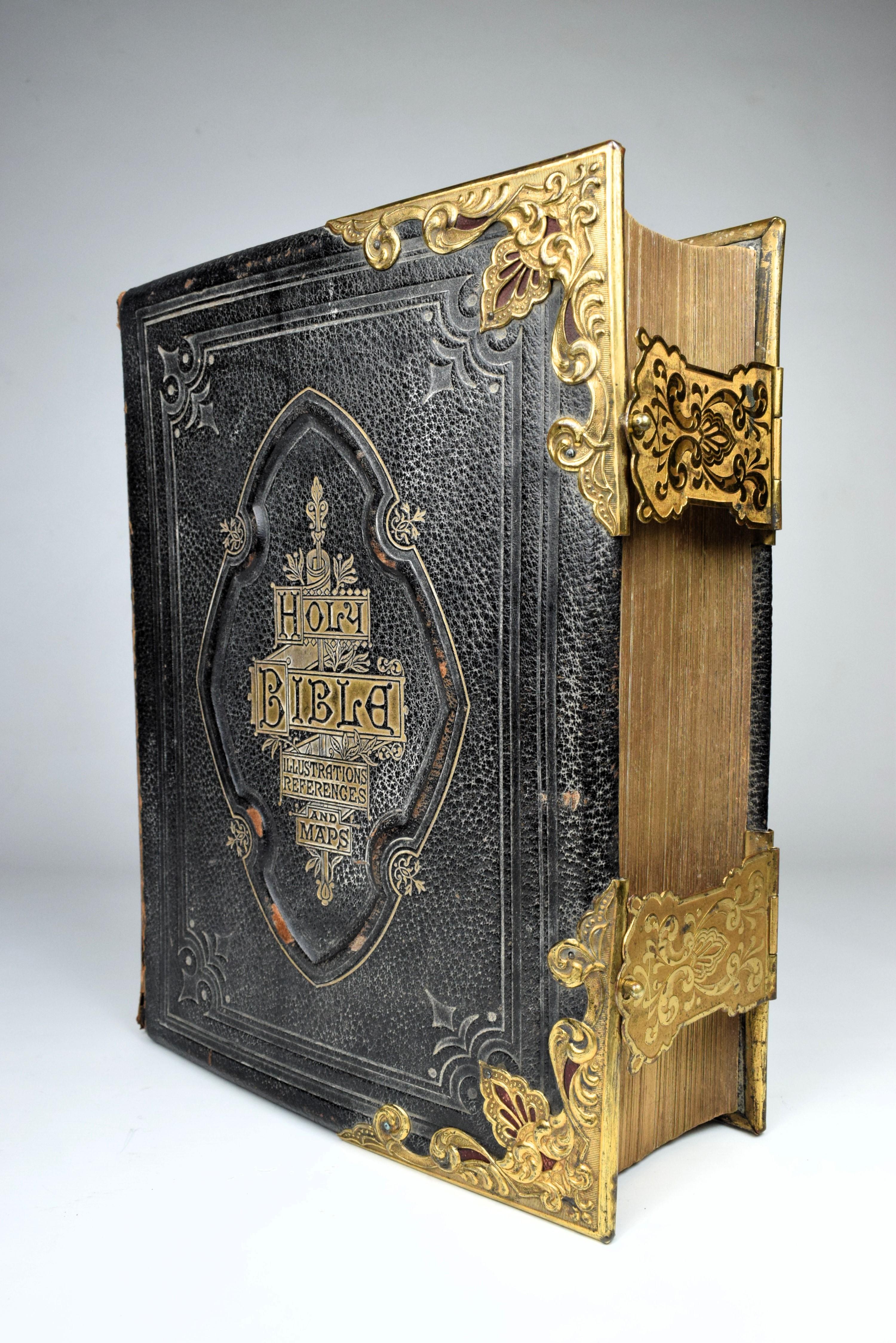 The Holy Bible With An Abridgement Of The Commentaries Of Scott And Henry

Bound in full navy Morocco with the covers displaying open-tooled bordering details, an indented central titular crest in gilt-tooling, and gold-plated floral corner caps