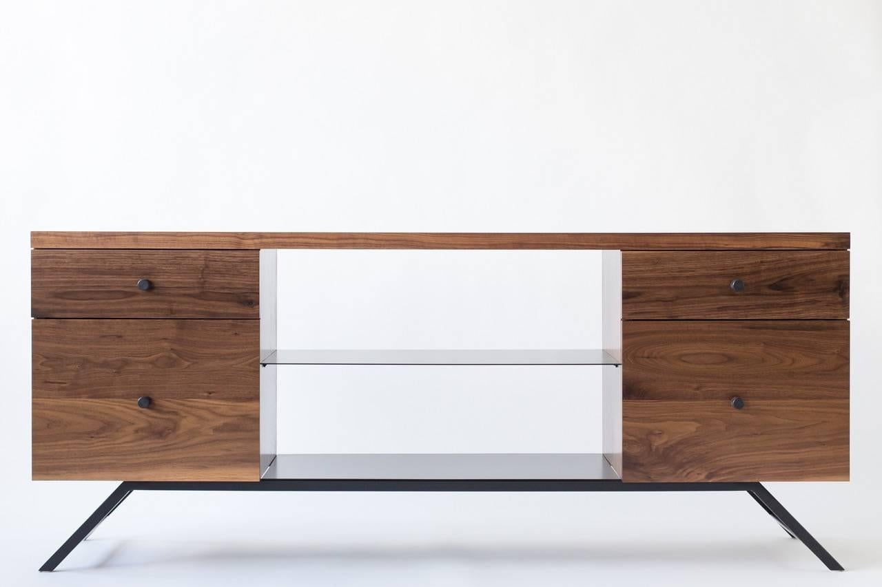 The Hudson, Modern Walnut and Powder Coated Steel Credenza.

Handcrafted from solid walnut and steel in Portland, Oregon. The Hudson brings timeless modern design to either office or home. Four walnut drawers and two powder coated steel shelves