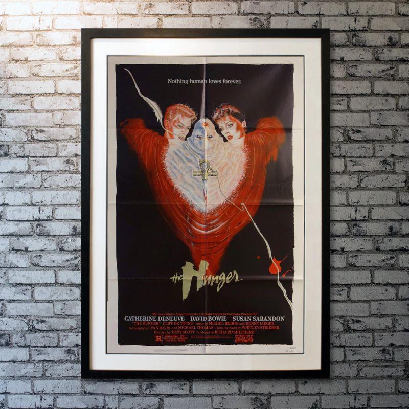 The Hunger, Unframed Poster, 1983

Original One Sheet (27 X 41 Inches).A love triangle develops between a beautiful yet dangerous vampire (Catherine Deneuve), her cellist companion (David Bowie), and a gerontologist (Susan Sarandon).

Year: