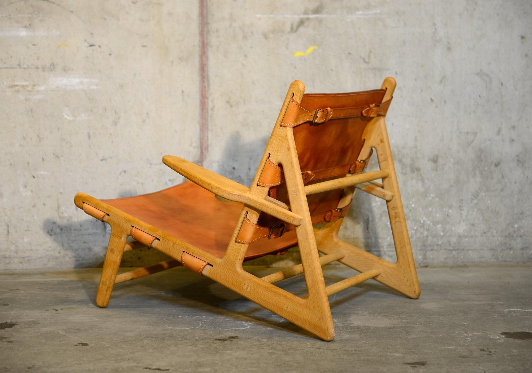 Untreated oak frame and cognac harness leather covers. Produced by Fredericia Furniture in Denmark in 2014. Designed by Danish Børge Mogensen in 1950. Craftsmanship , design and quality oak and leather in an iconic combination. Scandinavian modern /