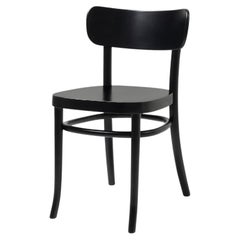 The Iconic Black Stained MZO Chairs in Beechwood by Mazo Design (Les chaises MZO emblématiques en bois de hêtre teinté noir)