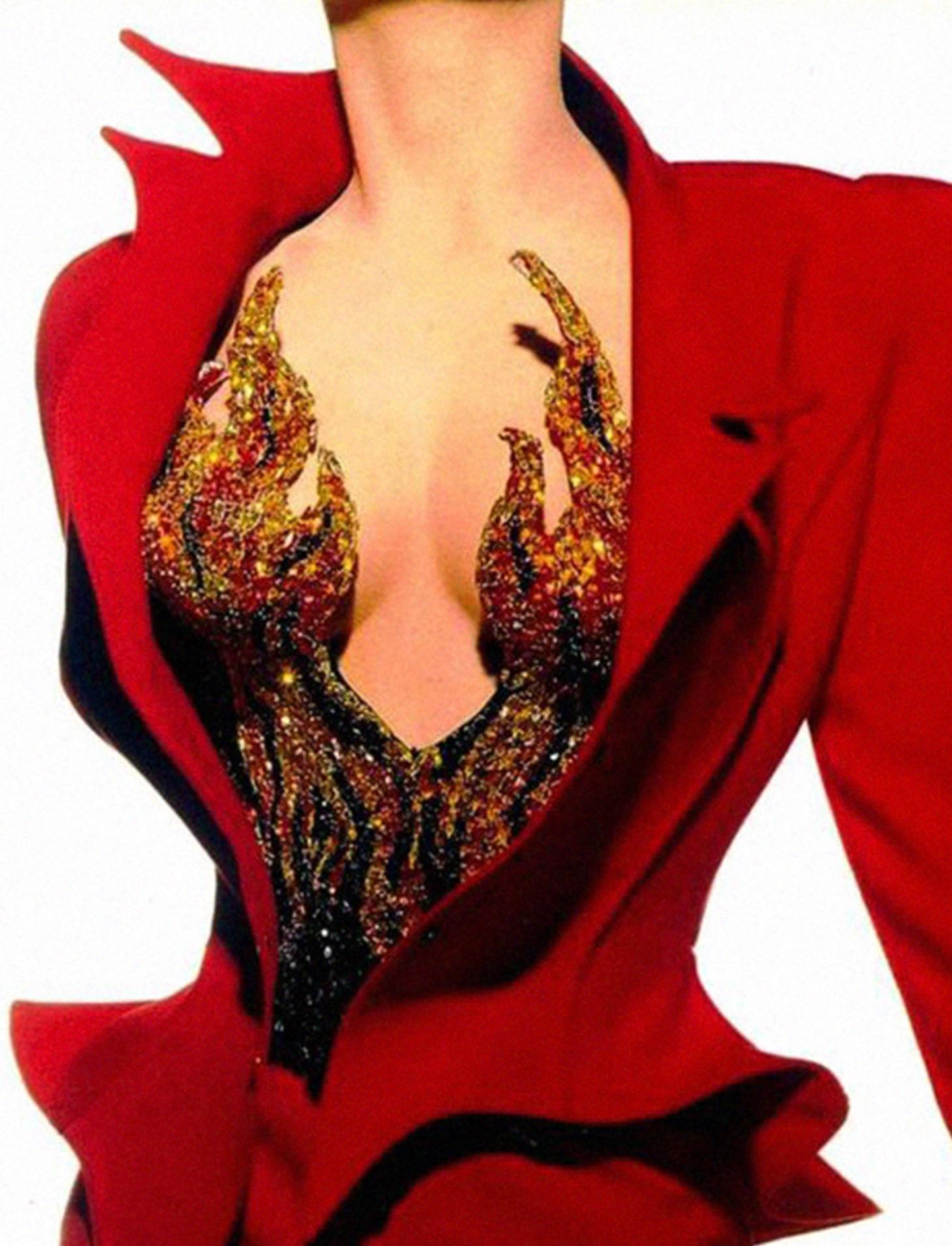 
Museum worthy piece of Fashion History

The fabulous iconic red skirt suit from the Thierry Mugler LES INFERNALES (She Devils) Collection FW 1988/ 1989. Two piece ensemble, jacket and skirt.
Very well documented as well as worn on. the runway by