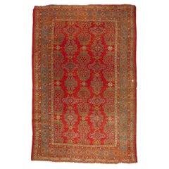 The Imperial Crimson Court: A Late-19th-Century Oushak Masterpiece of Nobility