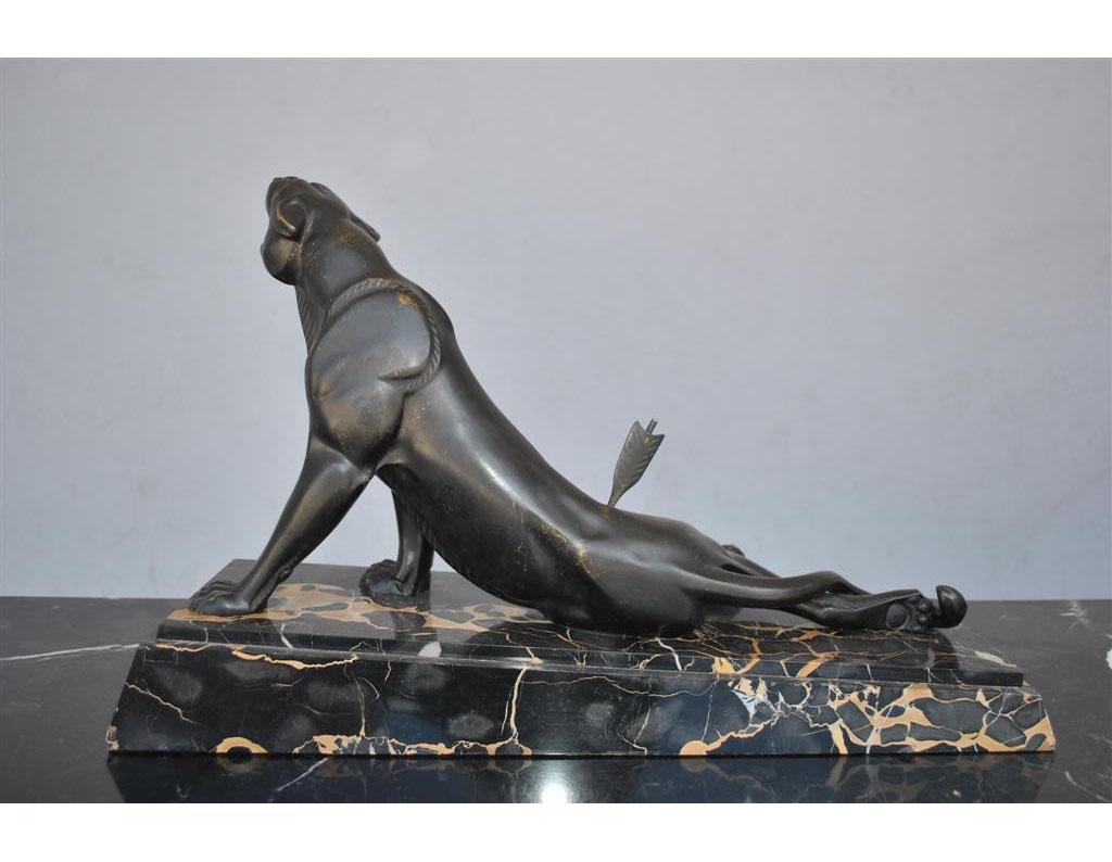 Bronze black patina by Louis Albert Carvin (1875-1951). The black panther hurted by arrow in the Art Deco style of the 1930s.