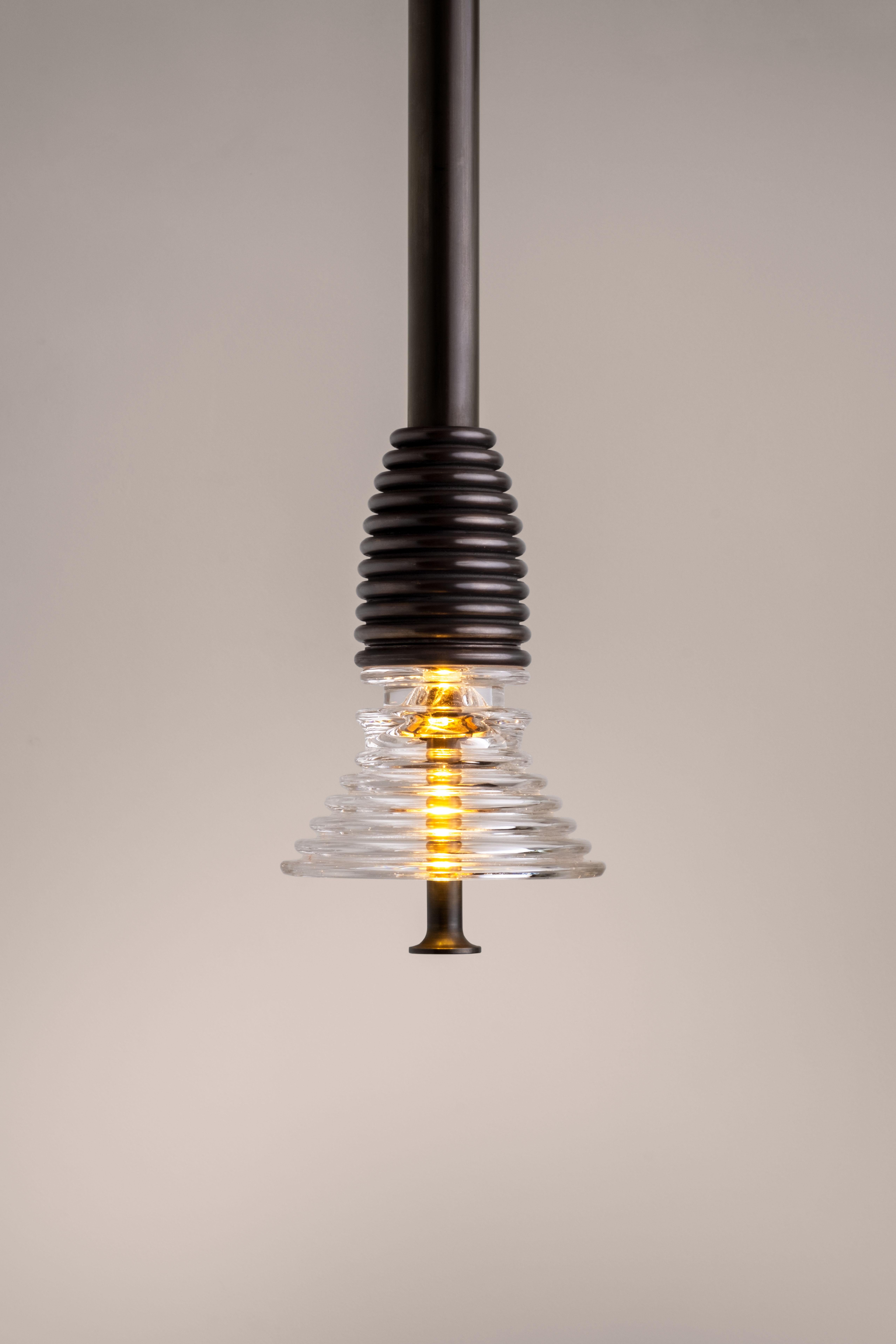 The Insulator 'A' Pendant in dark brass and clear glass by NOVOCASTRIAN deco For Sale 1