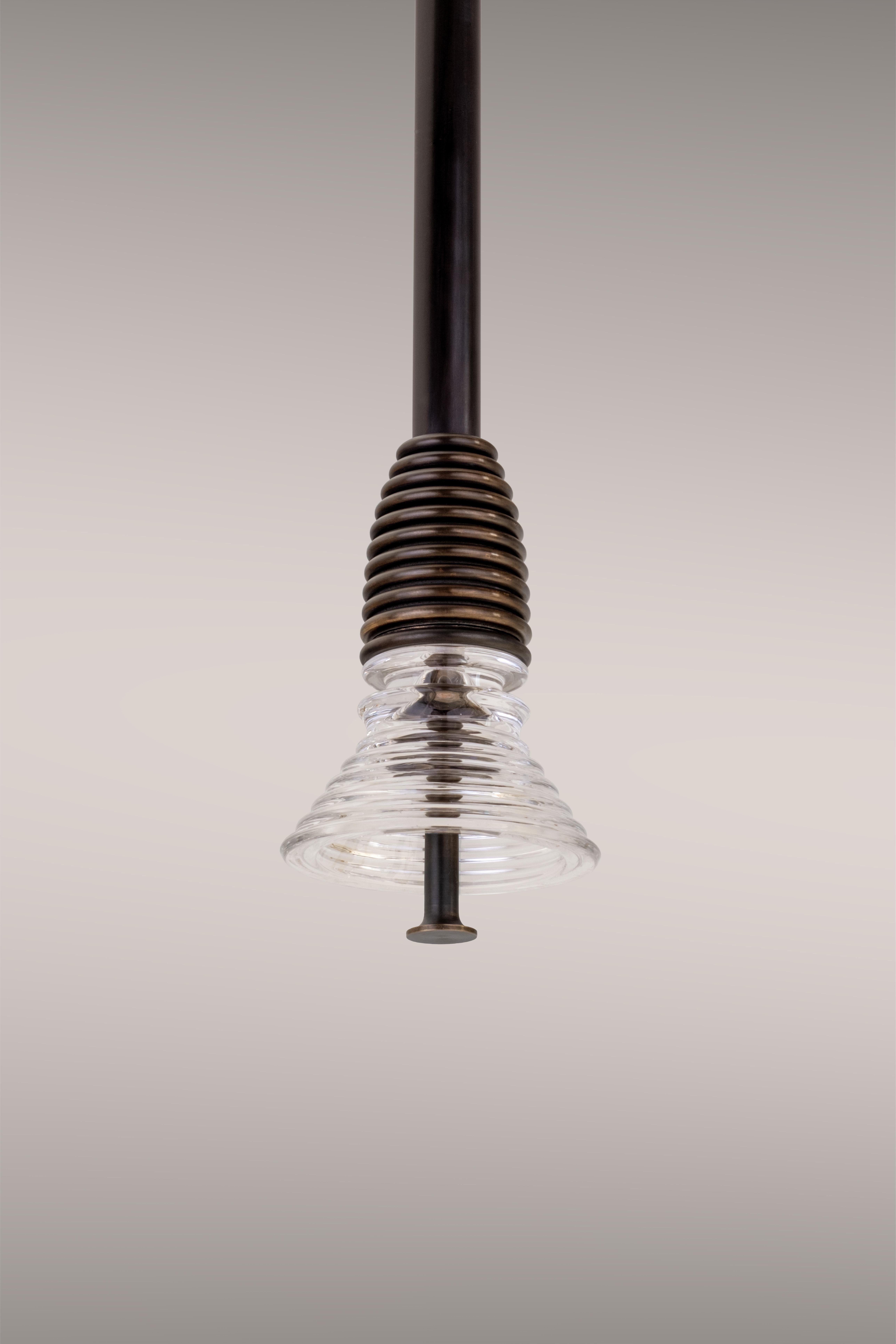 The Insulator 'A' Pendant in dark brass and clear glass by NOVOCASTRIAN deco For Sale