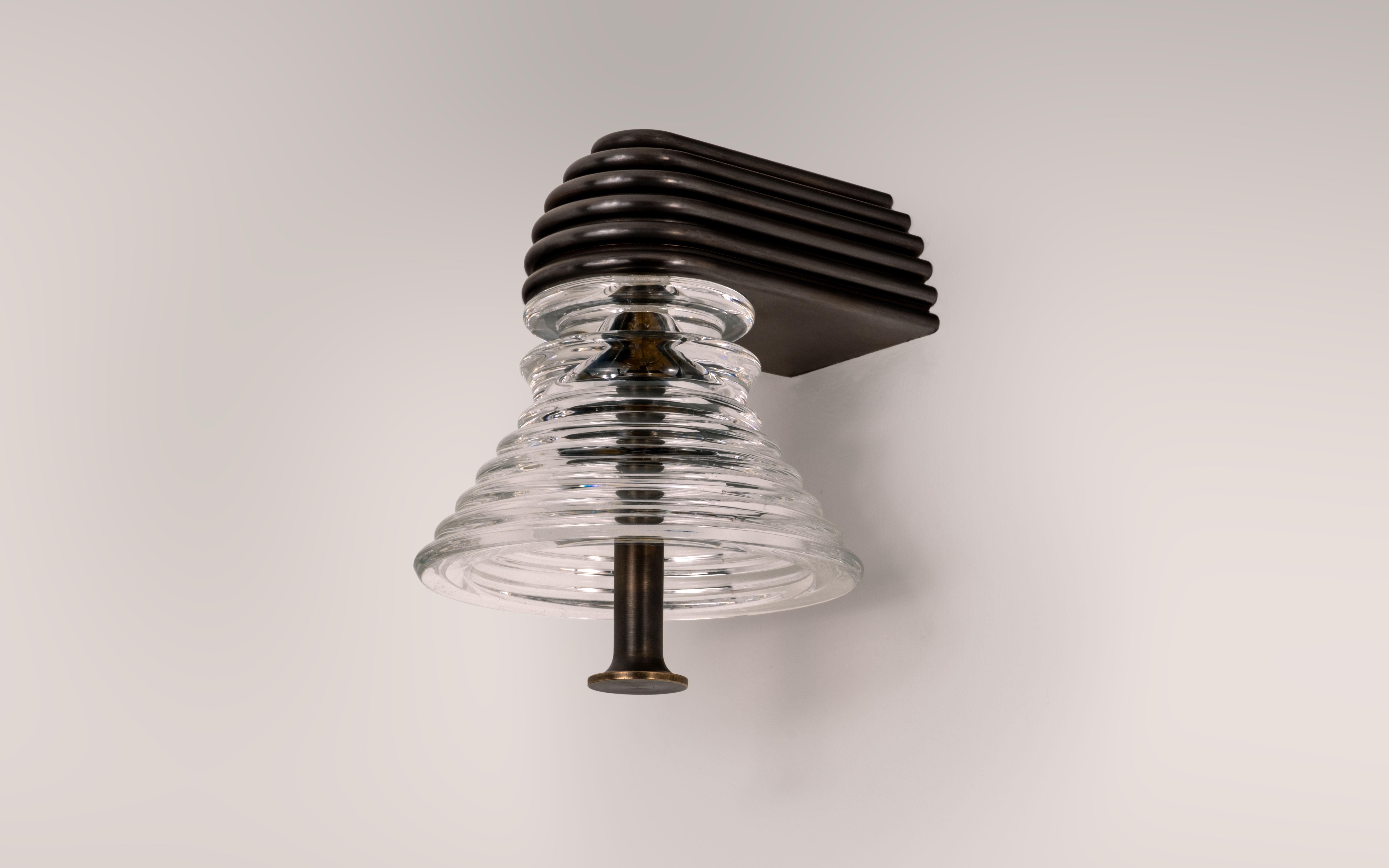 The Insulator 'A' Sconce in dark brass and clear glass by NOVOCASTRIAN deco In New Condition For Sale In Washington, GB