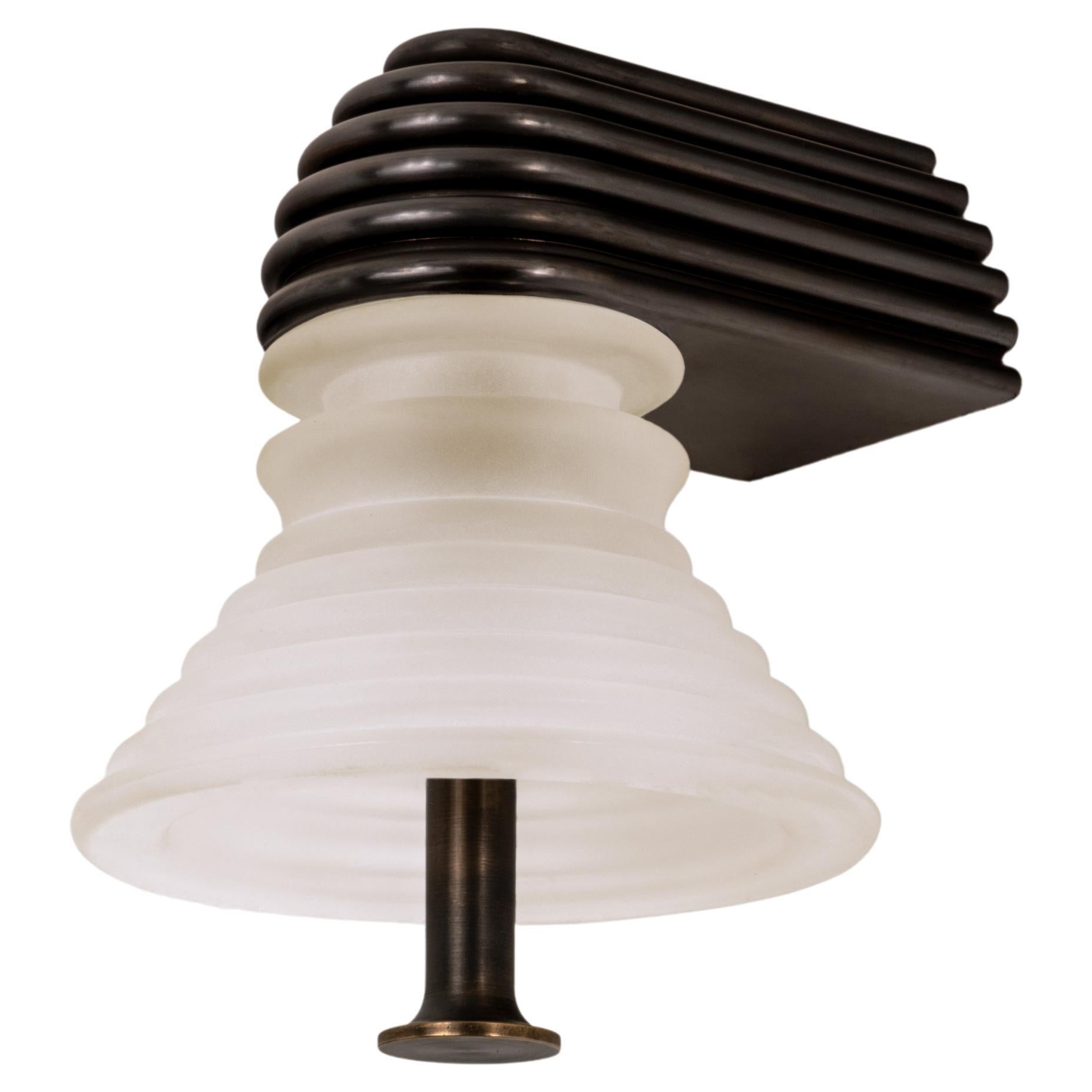 The Insulator 'A' Sconce in dark brass and frosted glass by NOVOCASTRIAN deco