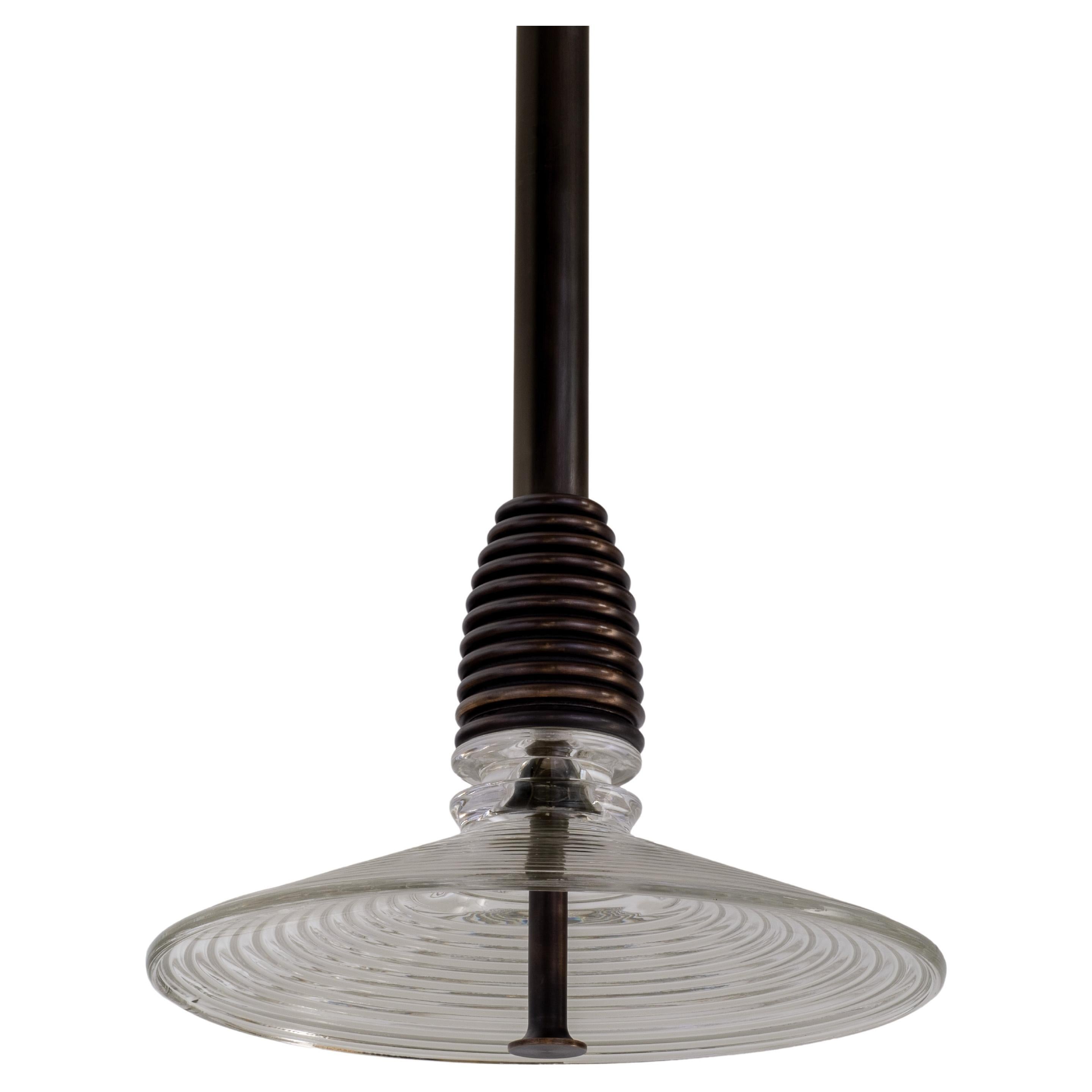 The Insulator 'B' Pendant in dark brass and clear glass by NOVOCASTRIAN deco For Sale