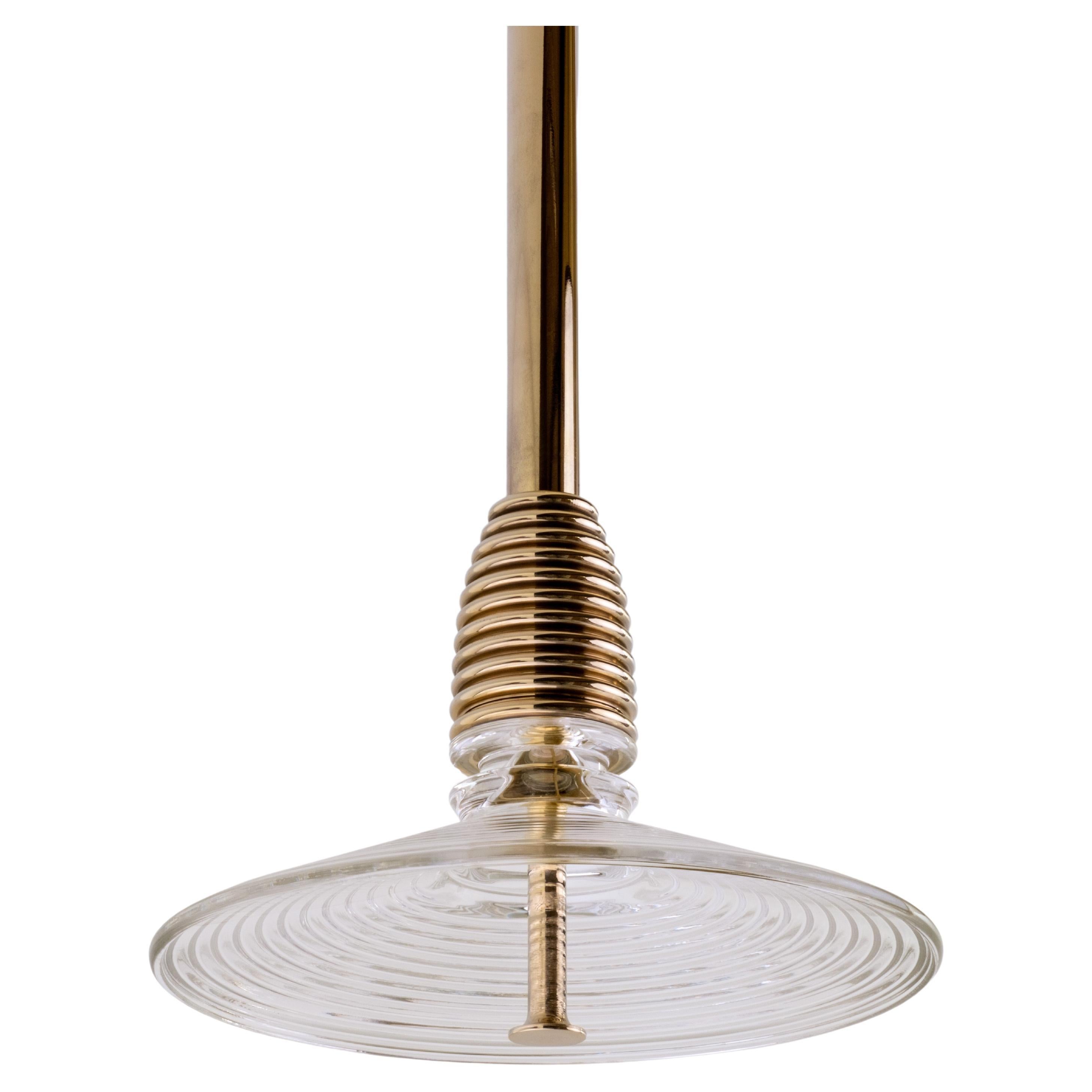 The Insulator 'B' Pendant in polished brass and clear glass by NOVOCASTRIAN deco
