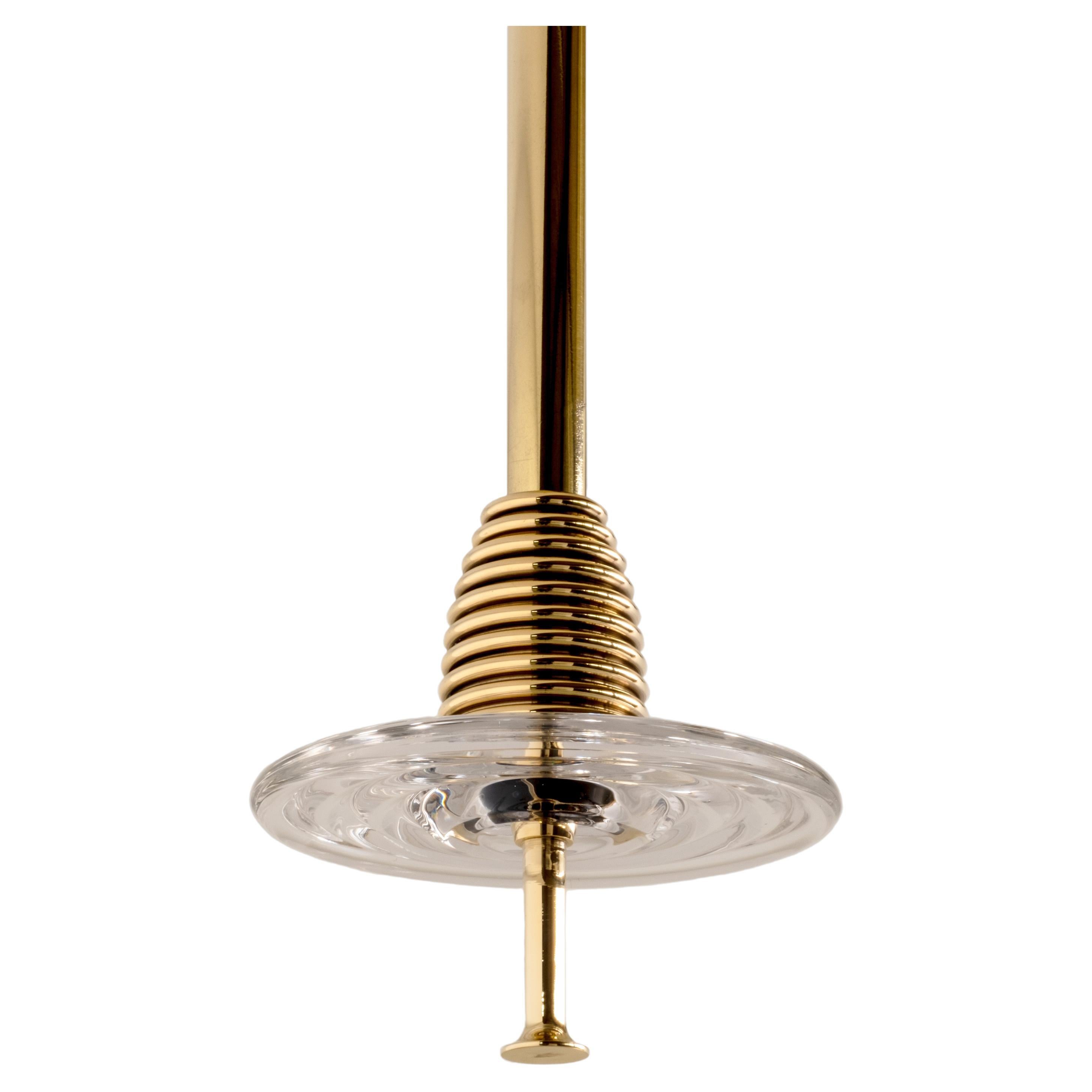 The Insulator 'C' Pendant in polished brass and clear glass by NOVOCASTRIAN