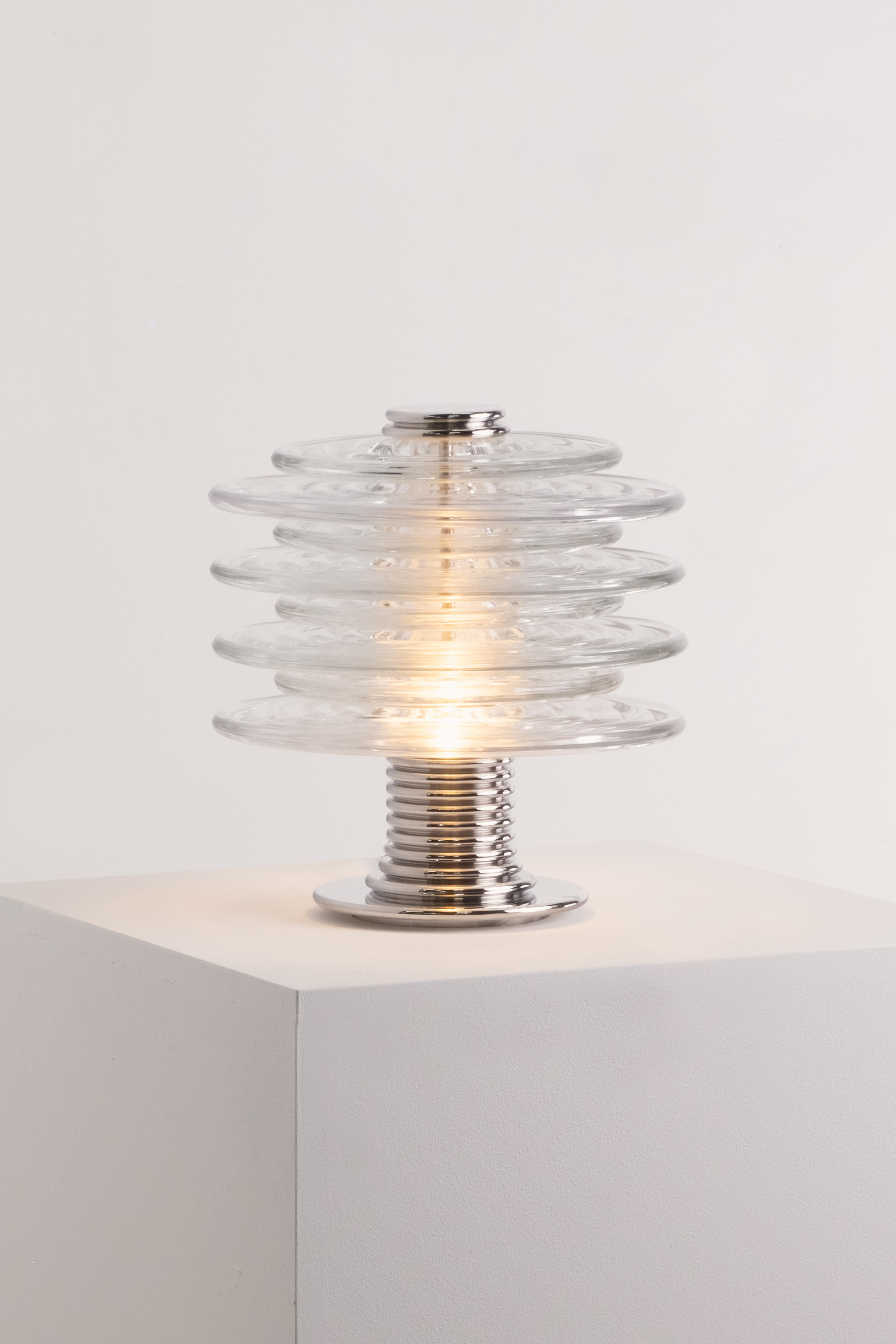 Inspired by our founder Richy's endless train journeys up and down Britain's East Coast mainline, by the rhythmic lattice of the overhead power lines, and by the intriguing saucer-like pin insulators which adorn them, The Insulator Collection is