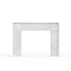 The Jackson: A Modern Marble Fireplace with Ridges and Squares