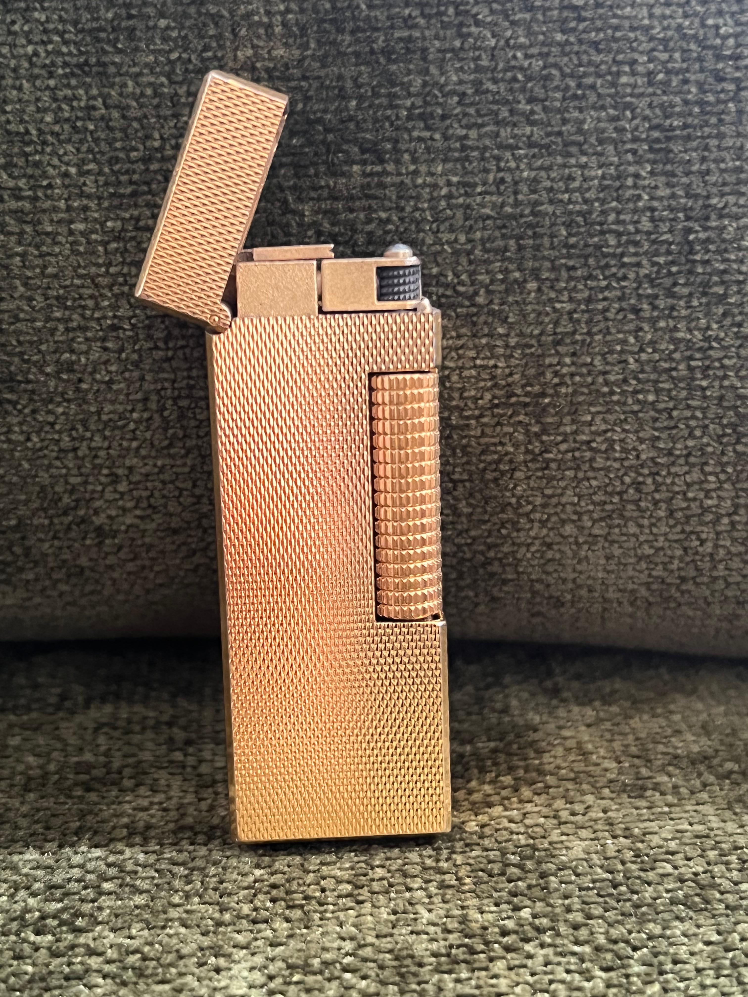 The James Bond Iconic and Rare Vintage Dunhill Gold and Swiss Made Lighter 3