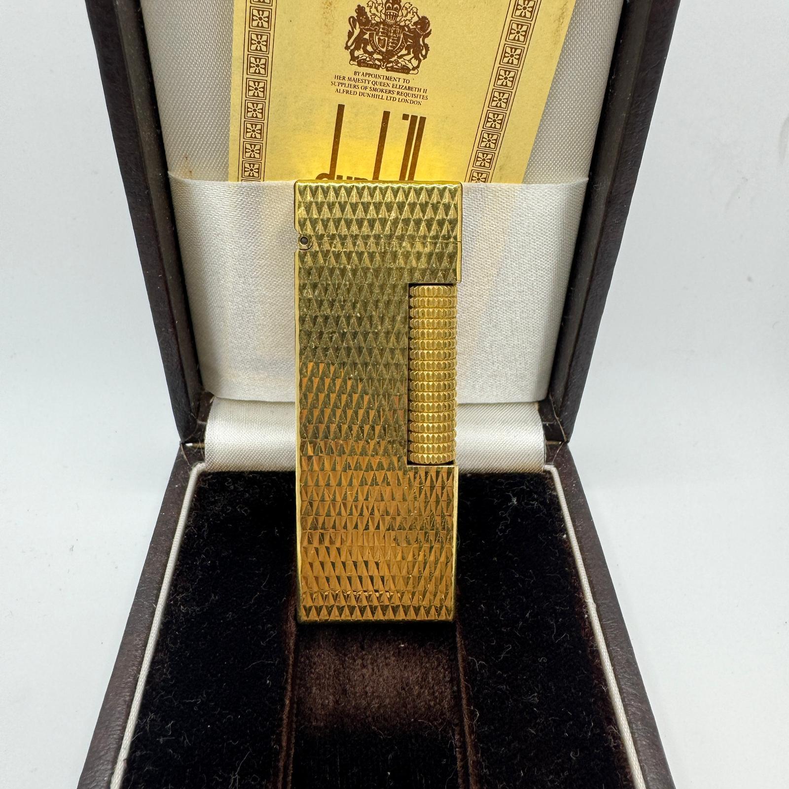 Rare Iconic Vintage and Elegant Dunhill 18K Gold Plated 
Circa 1980s 
Swiss Made Lighter
The James Bond lighter of choice 
In mint condition.
Works perfectly. 
Iconic and beautifully engineered piece in rare condition.
In original BRITISH Case which