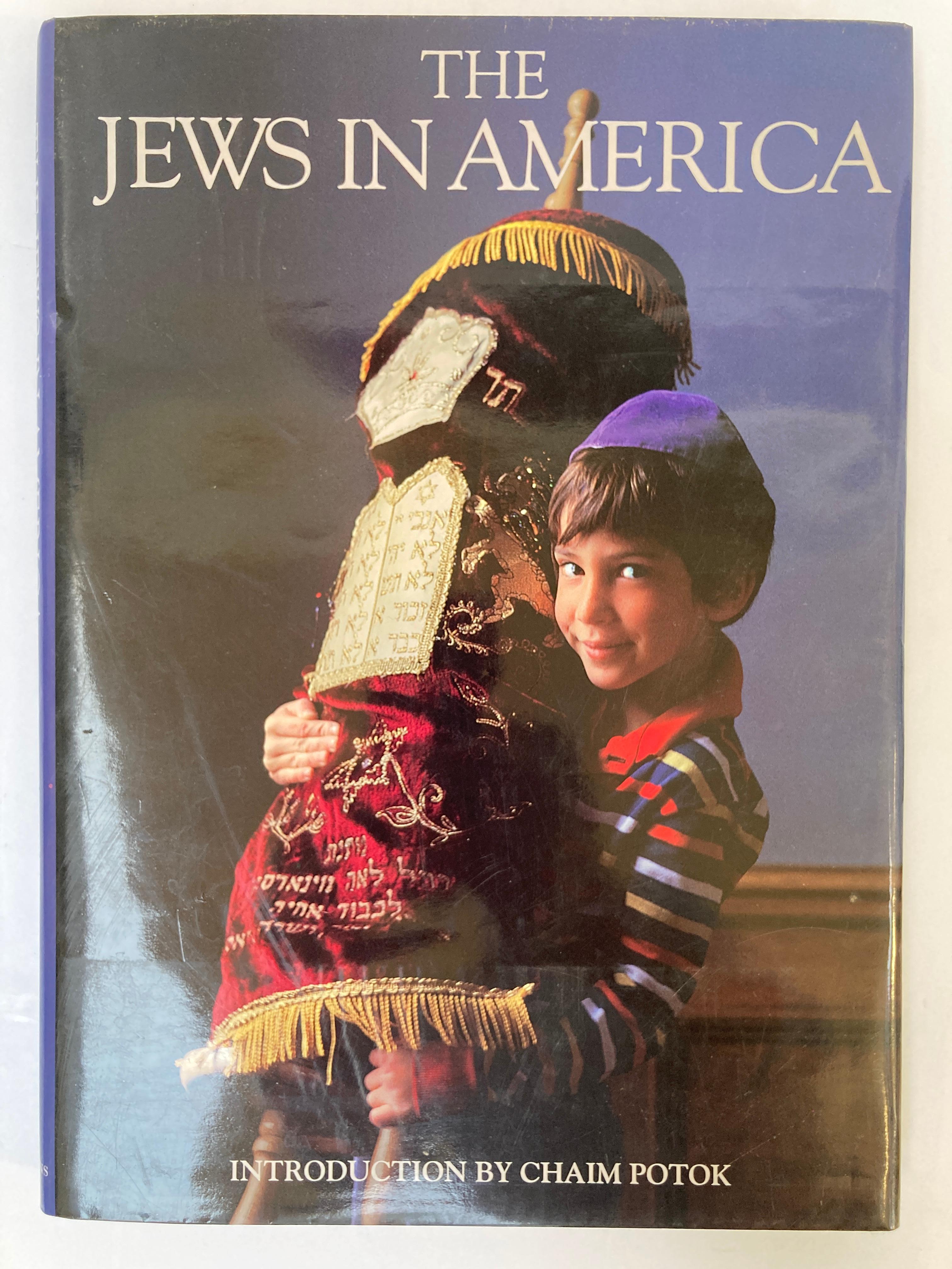 The Jews In America by David Cohen, hardcover coffee table book.
Introduction by Chaim Potok. 
Photographic essay. 
From editor’s note: 