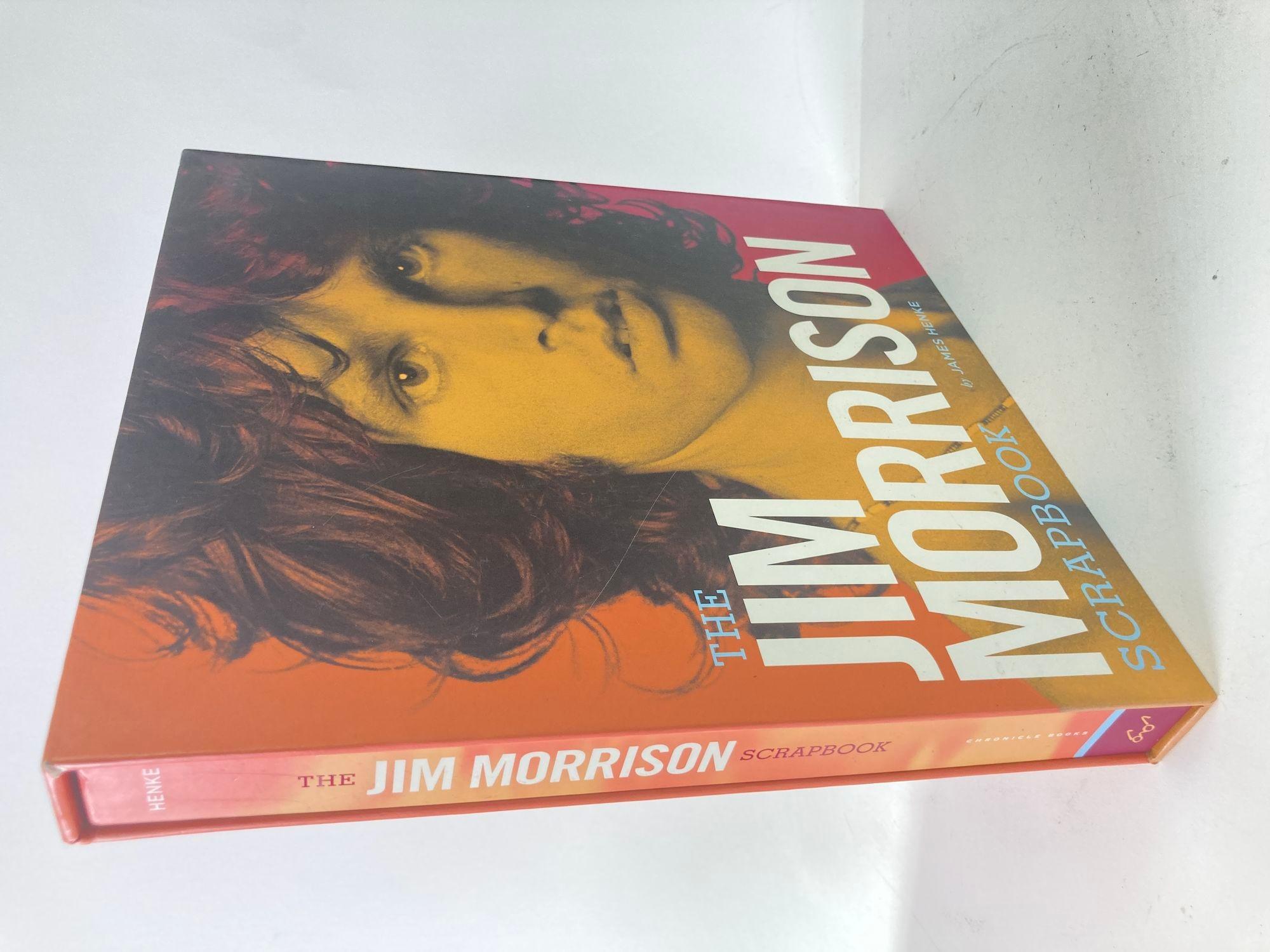 The Jim Morrison Scrapbook by Jim Henke (Author).Hardcover book in sleeve with CD.Produced with the fl cooperation of the Morrison estates, The Jim Morrison Scrapbook captures the wild life, mysterious death, and enduring work of the Doors'