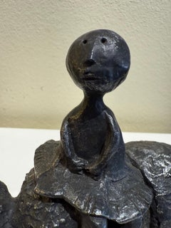 El viaje Niña sobre rinoceronte, escultura de bronce fundido de Graciela Rodo Boulanger