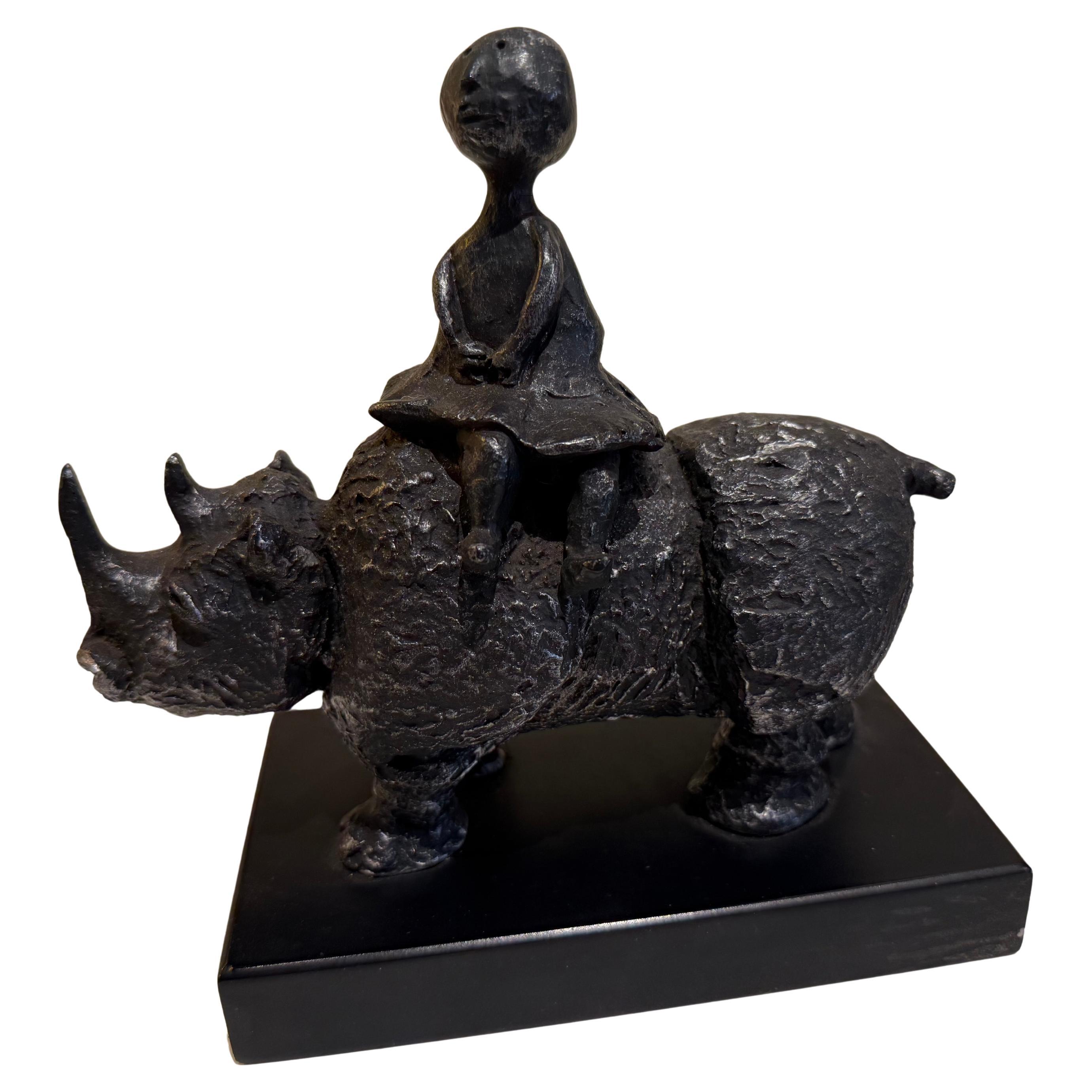 The Journey Girl On Rhino, Sculpture en bronze coulé par Graciela Rodo Boulanger