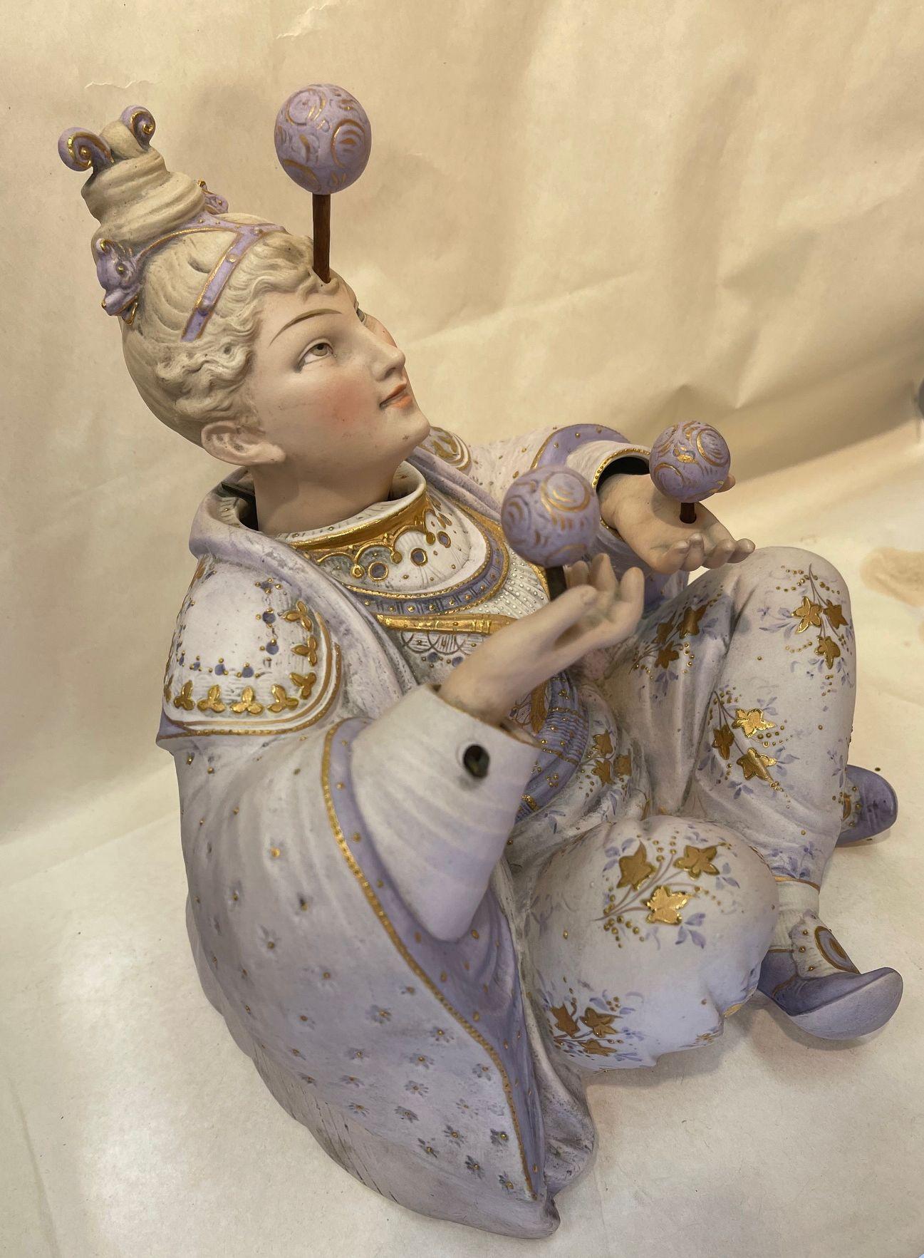 El Malabarista Porcelana Móvil  Escultura figurativa antigua Victoriano en venta