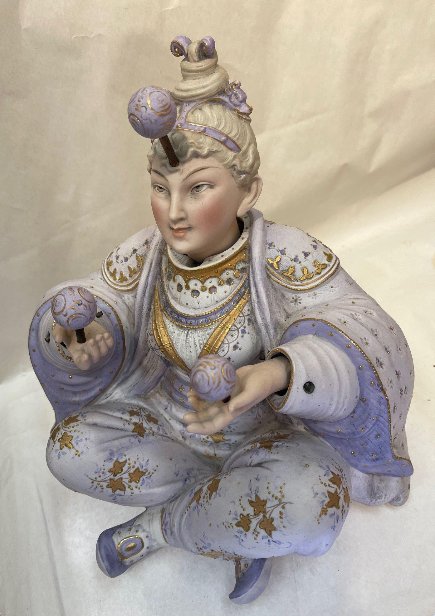 El Malabarista Porcelana Móvil  Escultura figurativa antigua siglo XIX en venta