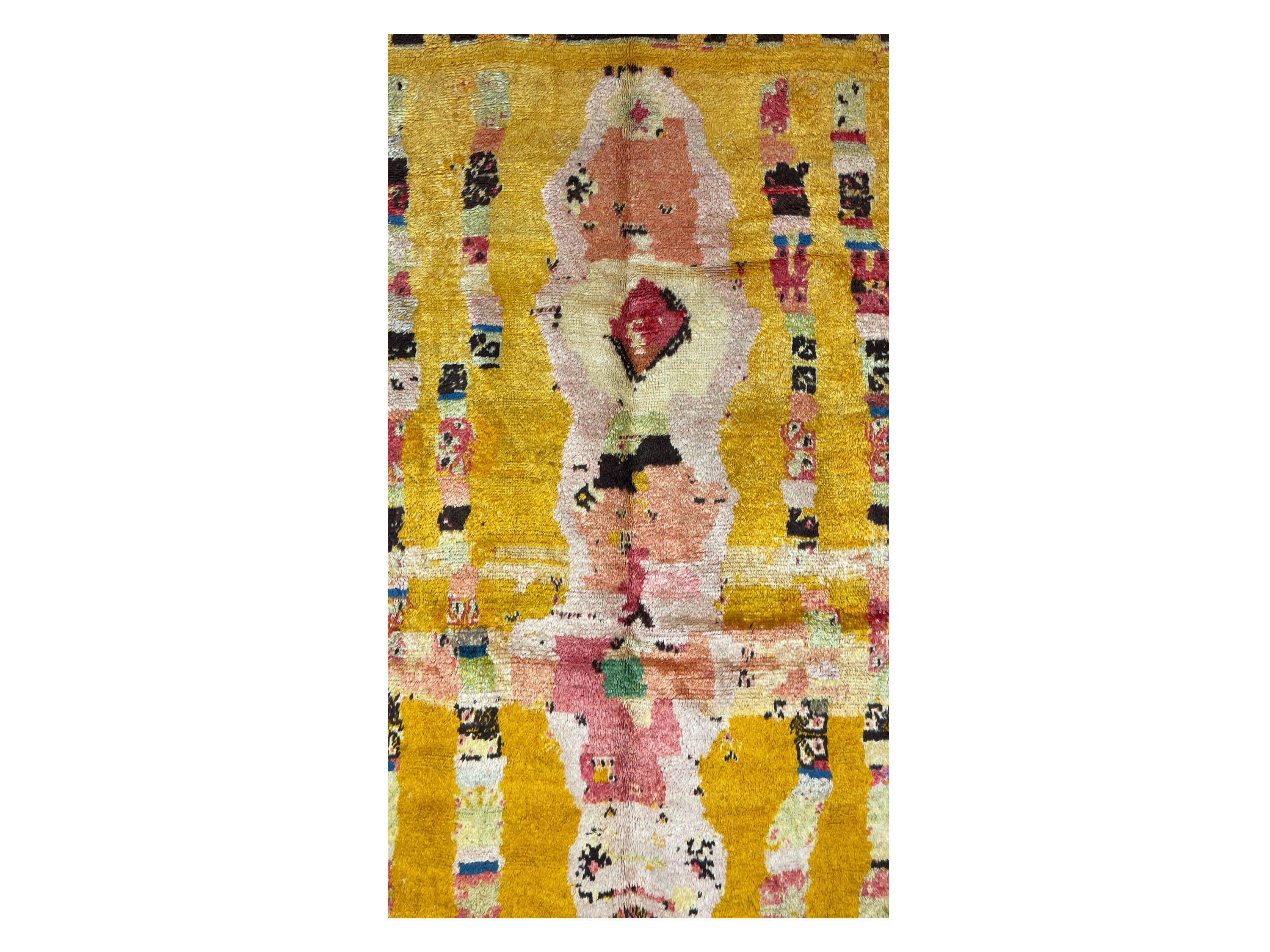 Along with the bright shades of gold and a stunning vintage pattern equalling a piece of art, this tribal rug boasts a rich culture deep within the mountains that will make a statement into any interior. 

“The King” is perfectly described as