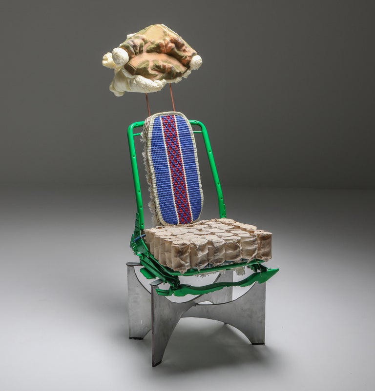 'The King of Tiébélé' chair is a functional art piece and collectable design that features a frame attributed to Philippe Hiquily, a seat from a Pontiac 72, pocket spring seat from Lionel Jadot's grandfather’s workshop, a backrest made from a