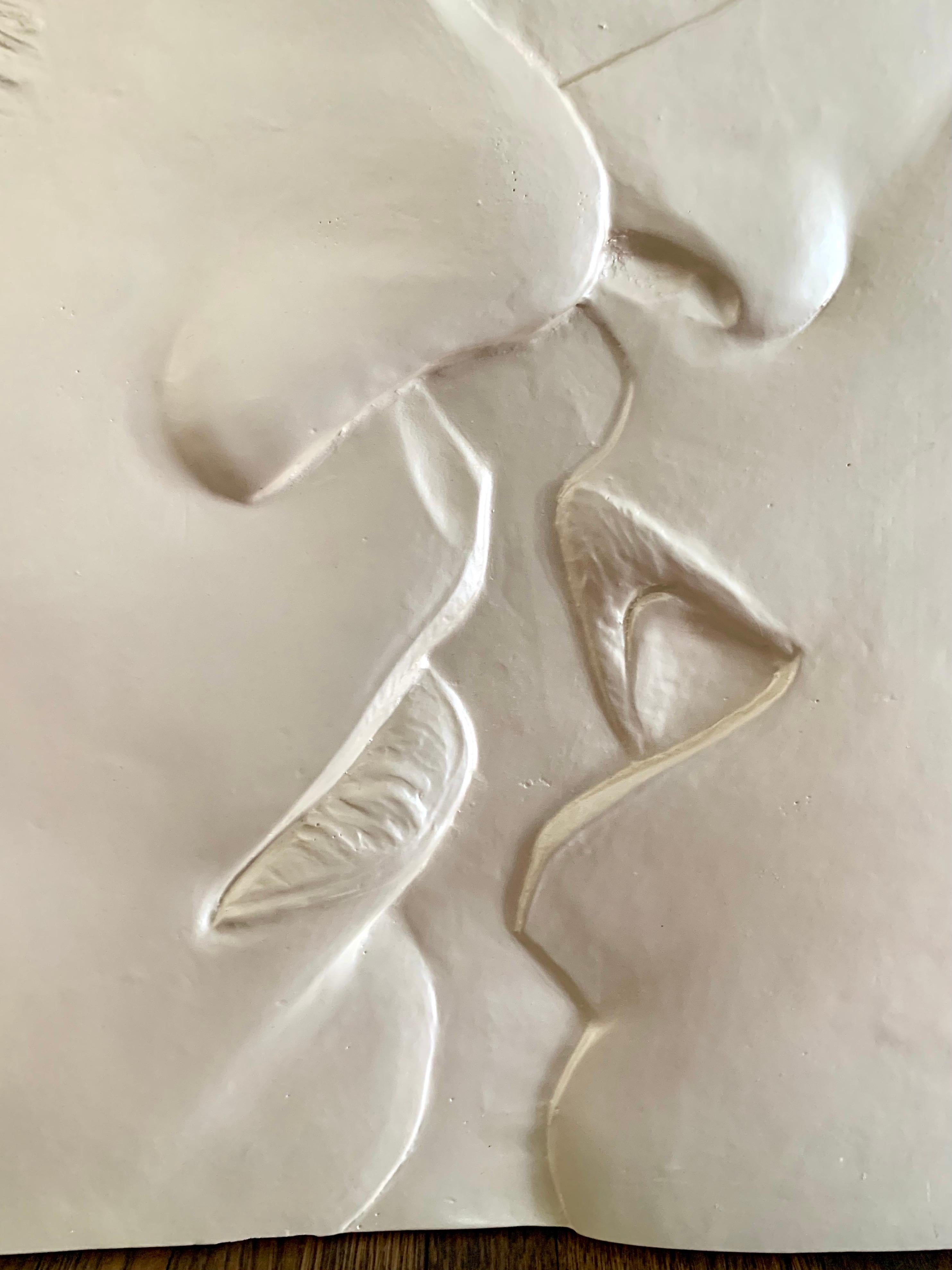 Signed 3-D plaster relief sculpture of a kiss. Signed lower right Figler 90.
Sculpture is meant to lean against a wall as there is no hardware for mounting. Made of solid plaster and is very heavy.