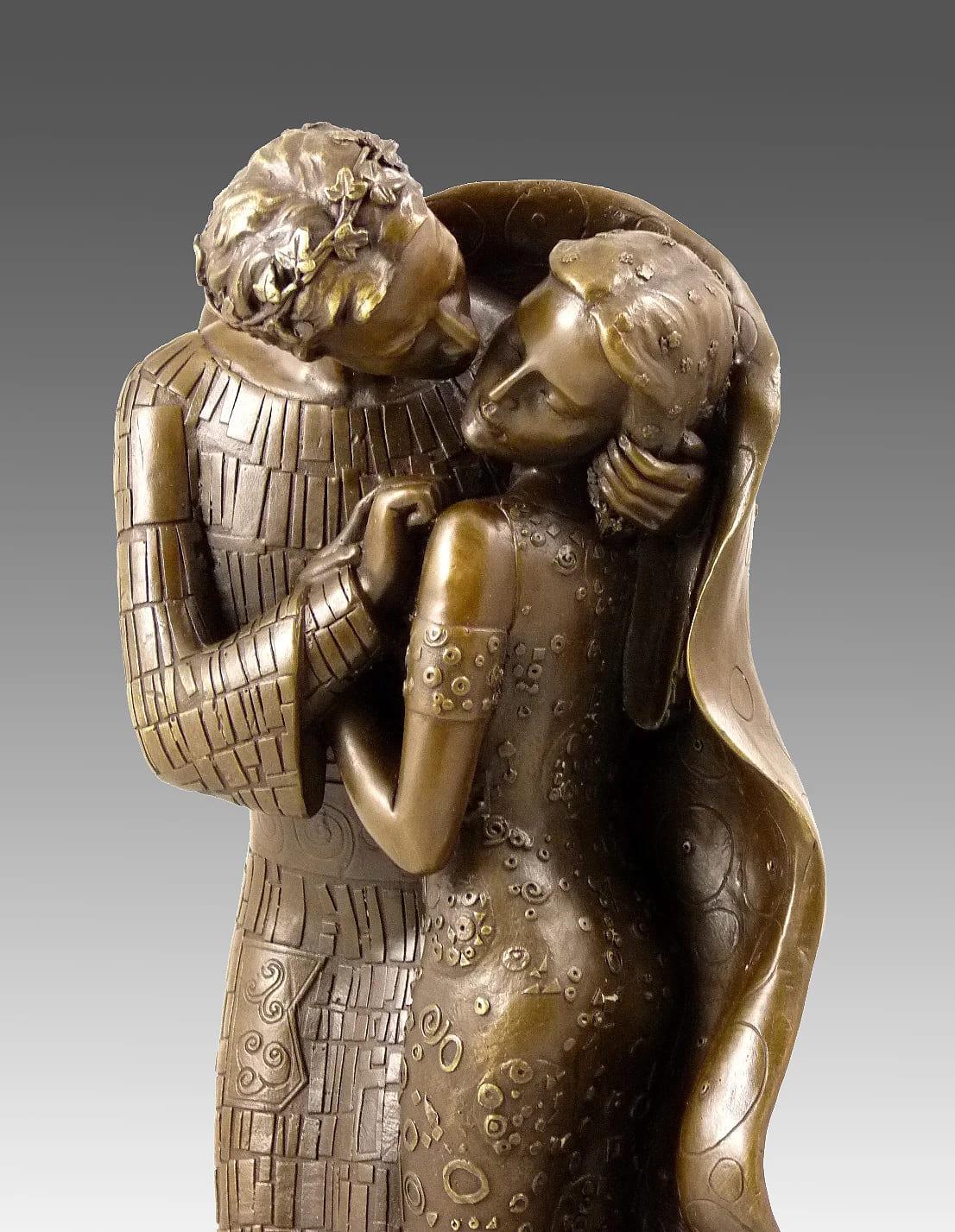 Bring the timeless romance of Gustav Klimt’s masterpiece into three-dimensional form with this exquisite bronze sculpture. Inspired by the iconic painting The Kiss from Klimt’s “Golden Period” (1908), the piece captures the lovers’ embrace in solid
