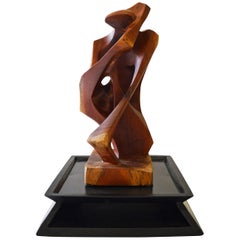"The Kiss" Stylized Teak Sculpture of a Couple Kissing
