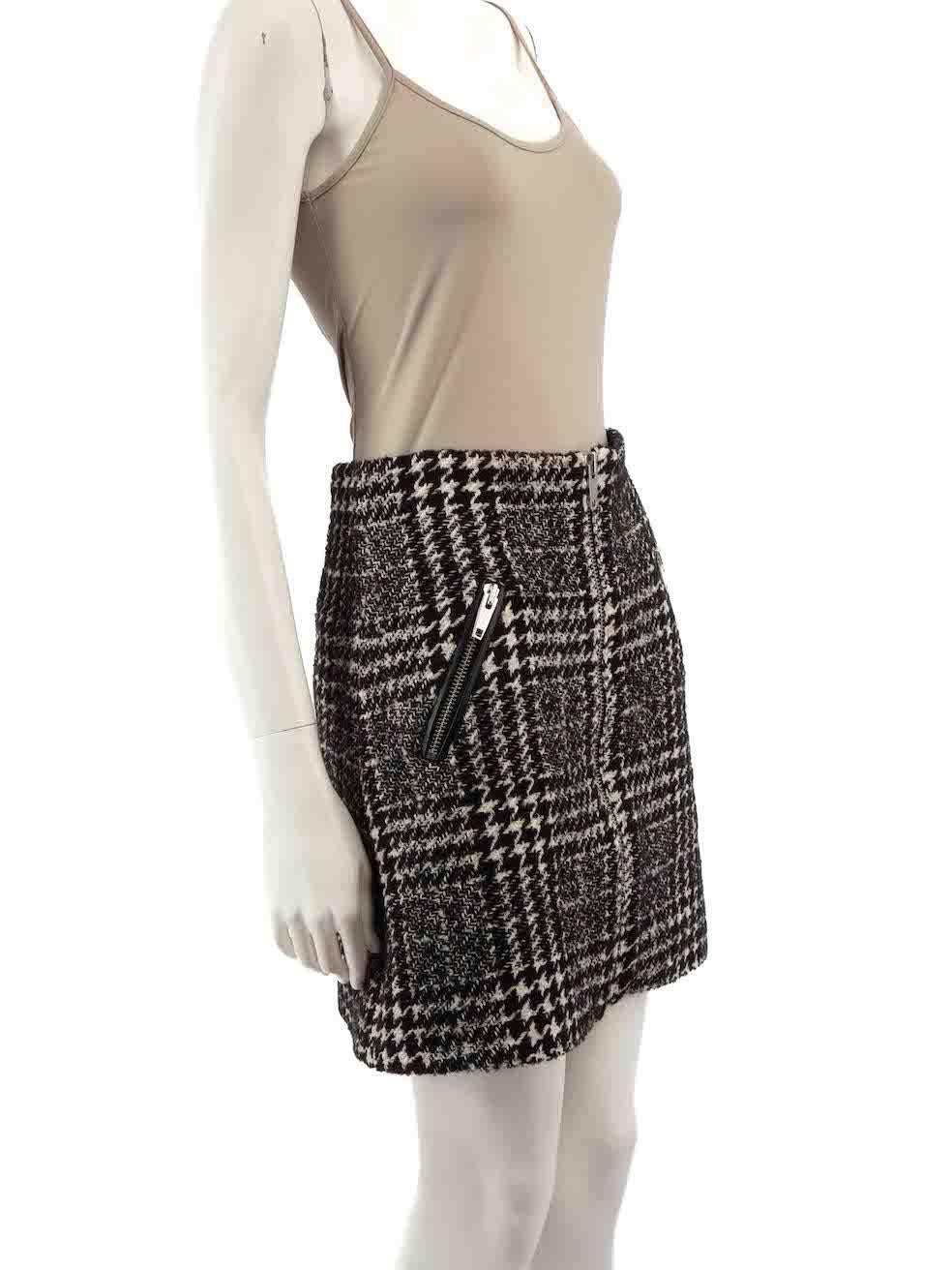 CONDITION is Very good. Hardly any visible wear to skirt is evident on this used The Kooples designer resale item.
 
 
 
 Details
 
 
 Black
 
 Synthetic
 
 Skirt
 
 Houndstooth pattern
 
 A-line
 
 Mini
 
 Front zip fastening
 
 2x Side pockets
 
