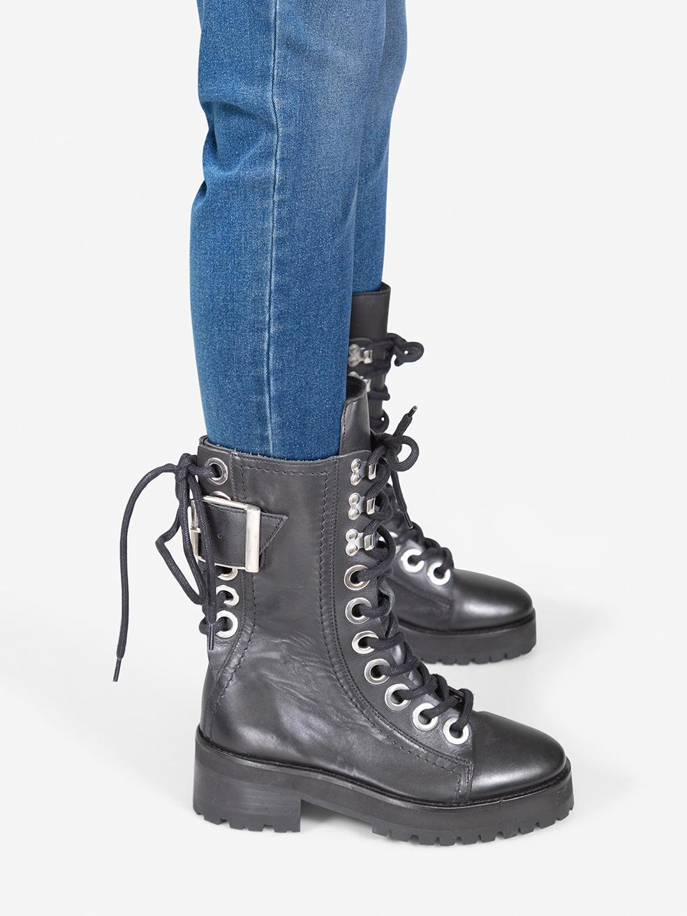 CONDITION is Very good. Minimal wear to the boots is evident. Abrasion on all leather areas on both shoes and both heels. Scratching to the buckle on both shoes on this used The Kooples designer resale item.
 
 Details
 
 
 Black¬†
 
 Leather
 
