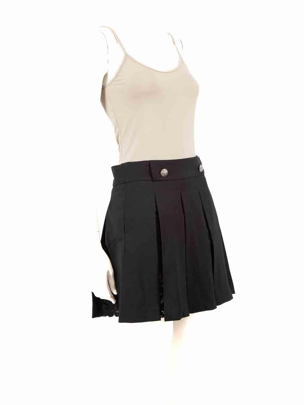 CONDITION is Very good. Hardly any visible wear to skirt is evident on this used The Kooples designer resale item.
 
 
 
 Details
 
 
 Black
 
 Wool
 
 Skirt
 
 Pleated
 
 Lace panel
 
 Mini
 
 Front button detail
 
 Side zip and hook fastening
 
 
