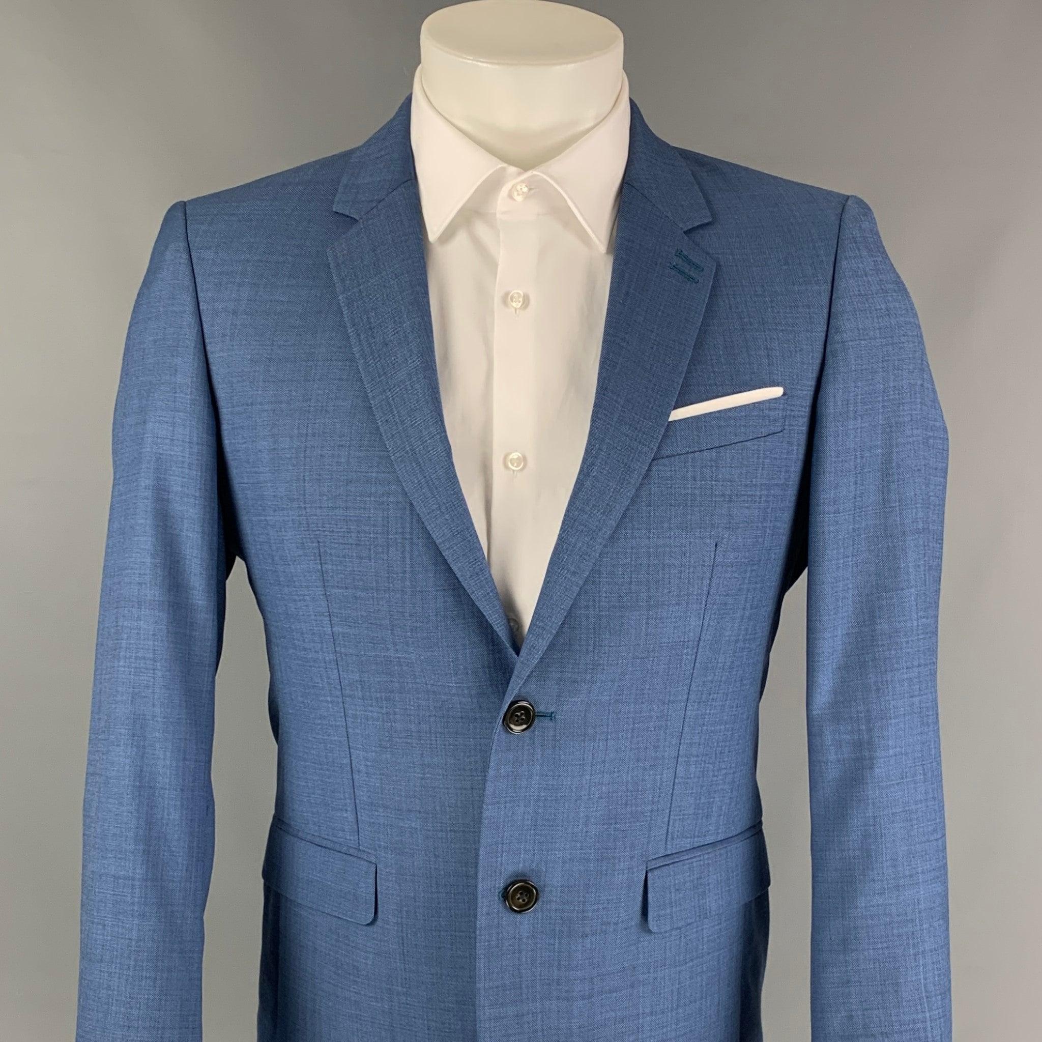 THE KOOPLES sport coat comes in a blue wool with a full liner featuring a notch lapel, flap pockets, and a double button closure.
Excellent
Pre-Owned Condition. 

Marked:   46 

Measurements: 
 
Shoulder: 17.5 inches Chest: 36 inches  Sleeve: 26.5