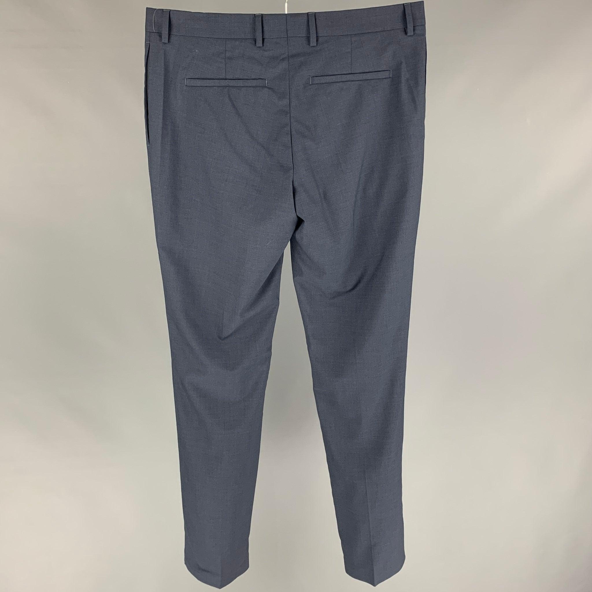 THE KOOPLES dress pants comes in a blue wool featuring a flat front, slim fit, front tag, and a zip fly closure.
New with tags.
 

Marked:   48 

Measurements: 
  Waist: 34 inches Rise: 9 inches Inseam: 34 inches Leg Opening: 14 inches 
  
  

