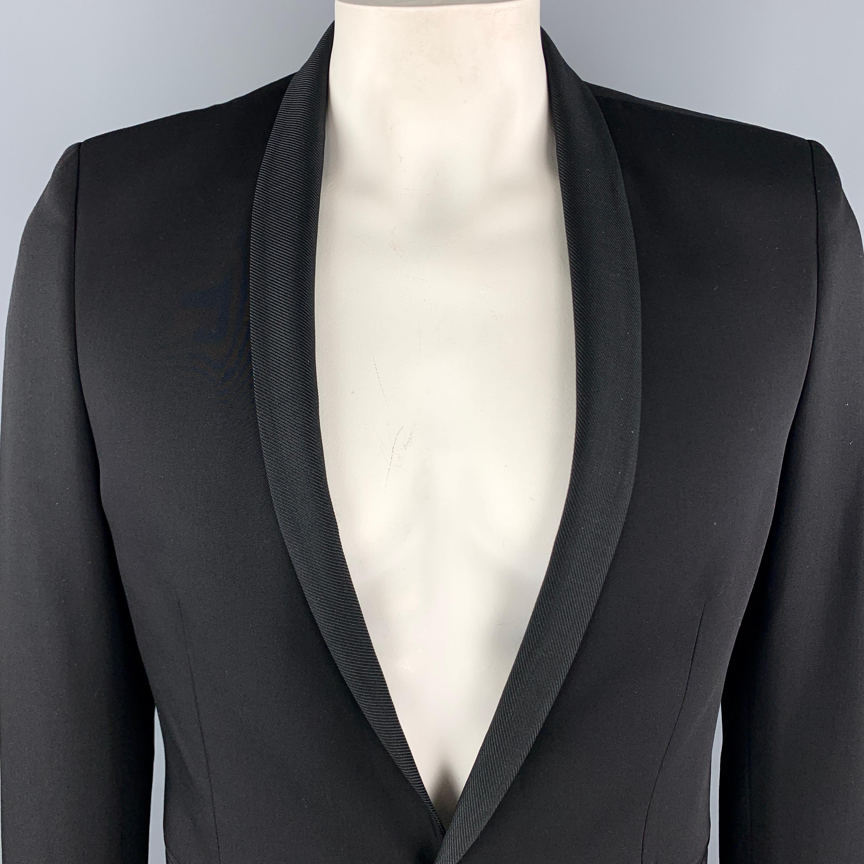 THE KOOPLES Fitted Sport Coat comes in a black solid wool material, with a shawl collar, a single button at closure, single breasted, slit pockets, functional buttons at cuffs, and a double vent at back.

Excellent Pre-Owned Condition.
Marked: IT