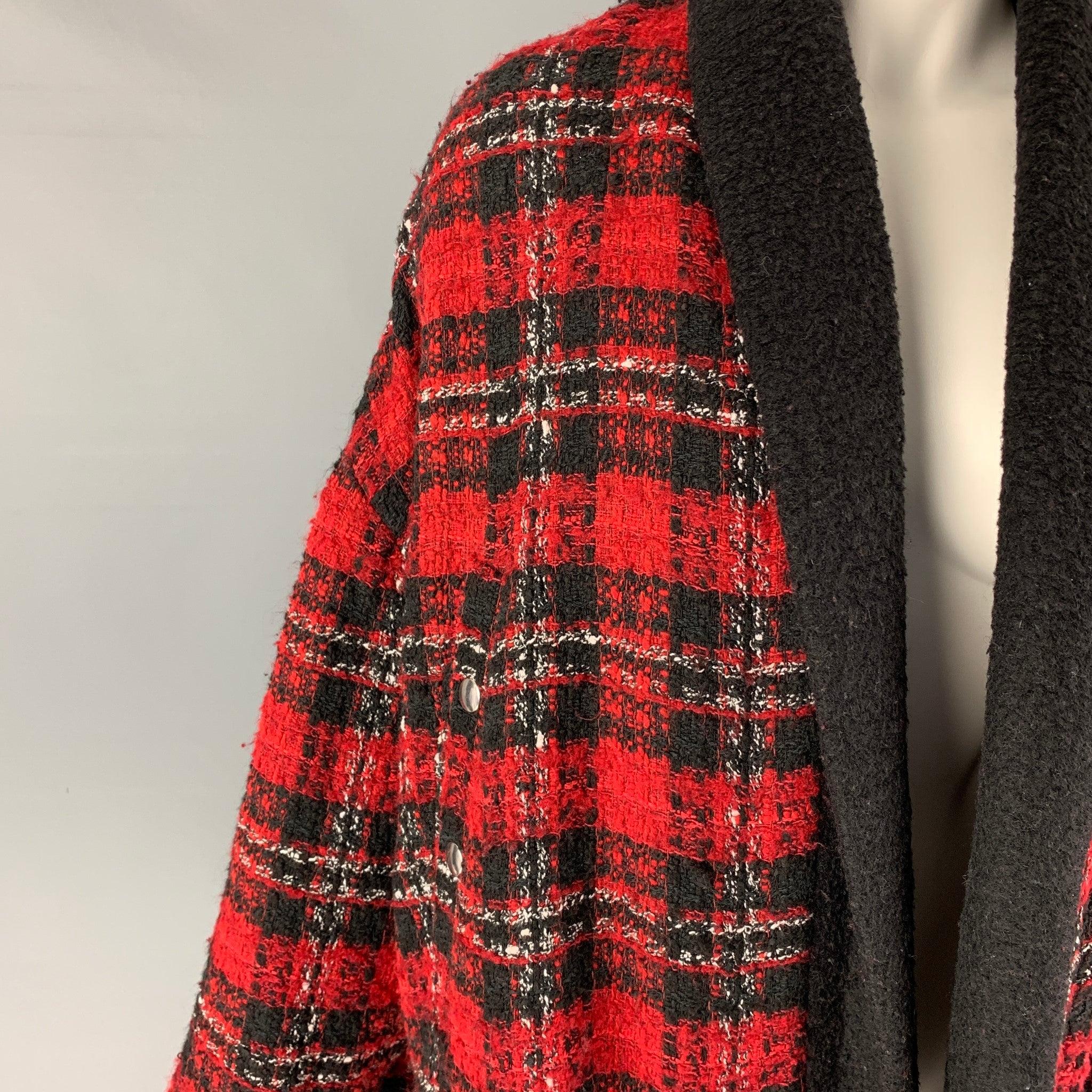 THE KOOPLES jacket comes in a red & black plaid acrylic blend featuring a shawl collar, oversized fit, flap pockets, and a open front.
Excellent
Pre-Owned Condition. 

Marked:   OS  

Measurements: 
 
Shoulder: 25 inches Bust: 64 inches Sleeve: 18.5