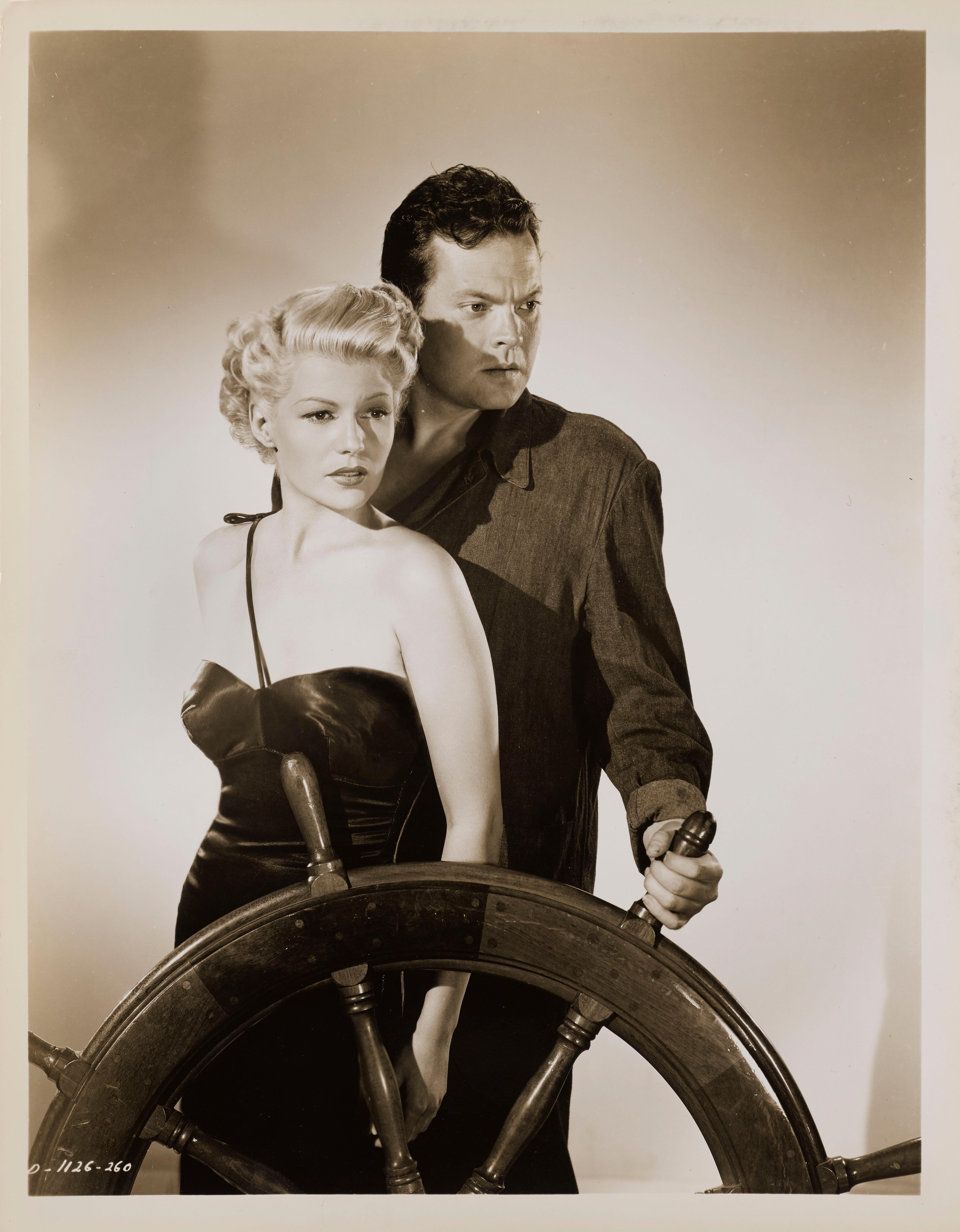 Original photographic production photo from 1948 film Noir The Lady from Shanghai starring Rita Hayworth, Orson Welles and directed by Orson Welles. The photo was taken by Robert Coburn (1900- 1990) This piece would be shipped flat in strong card.