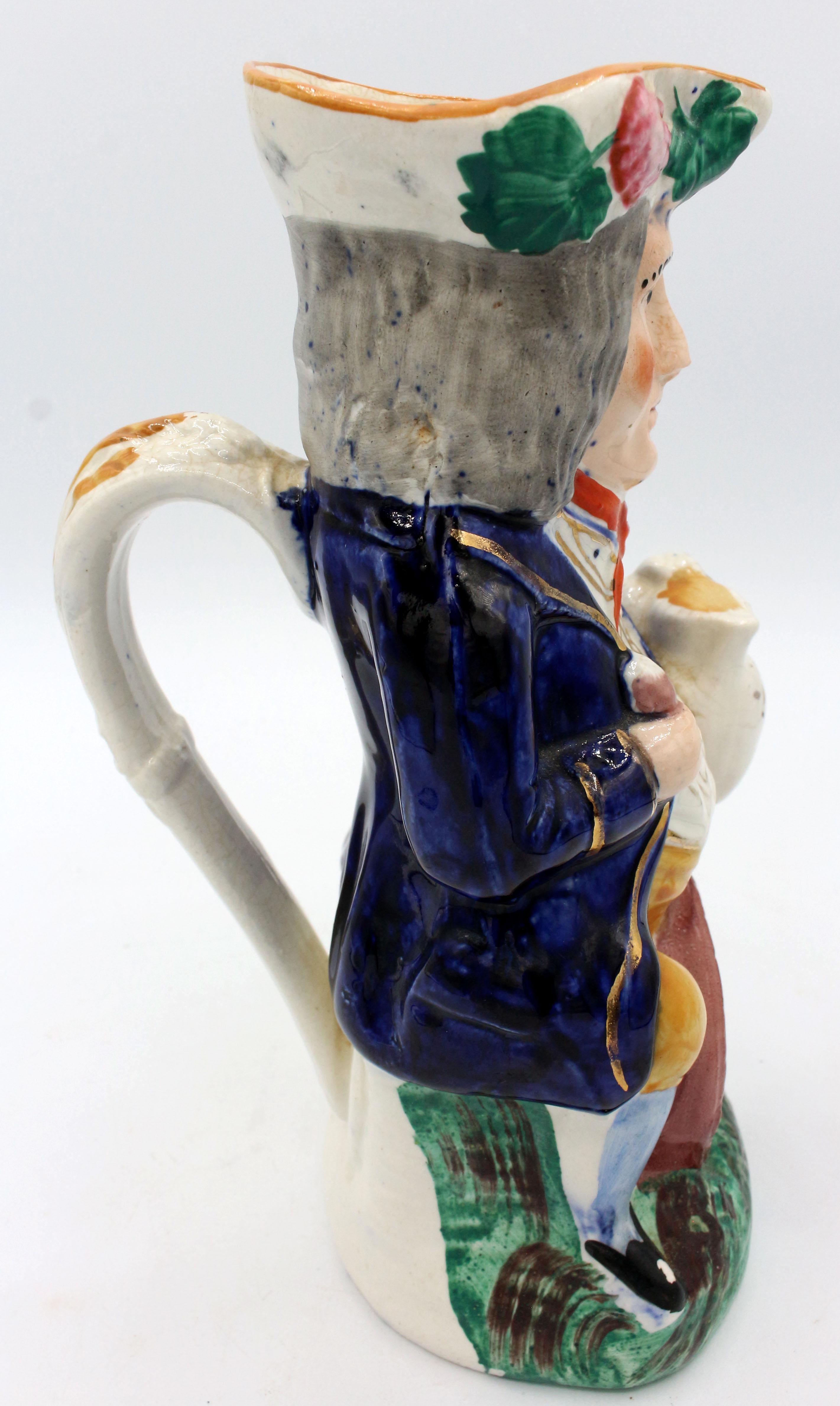 The Landlord Toby jug, circa 1860-80, Staffordshire, England. The chap looks askance - watching a suspicious customer? He is seated on his keg of 