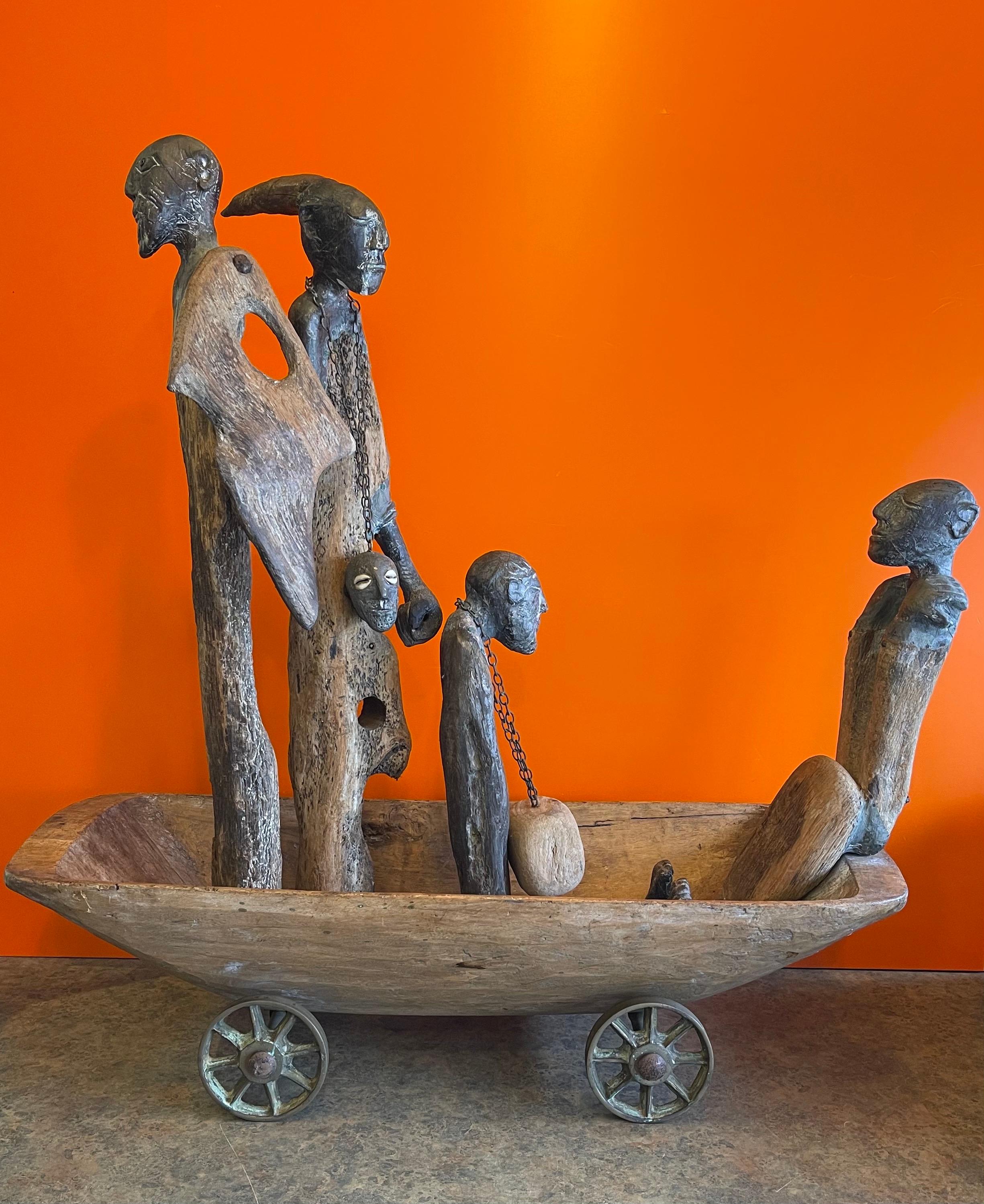 Magnificent figural hand carved driftwood sculpture entitled 