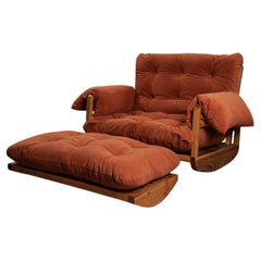 The Laziness Armchair in Brazilian Solid Wood with a rocking footstool