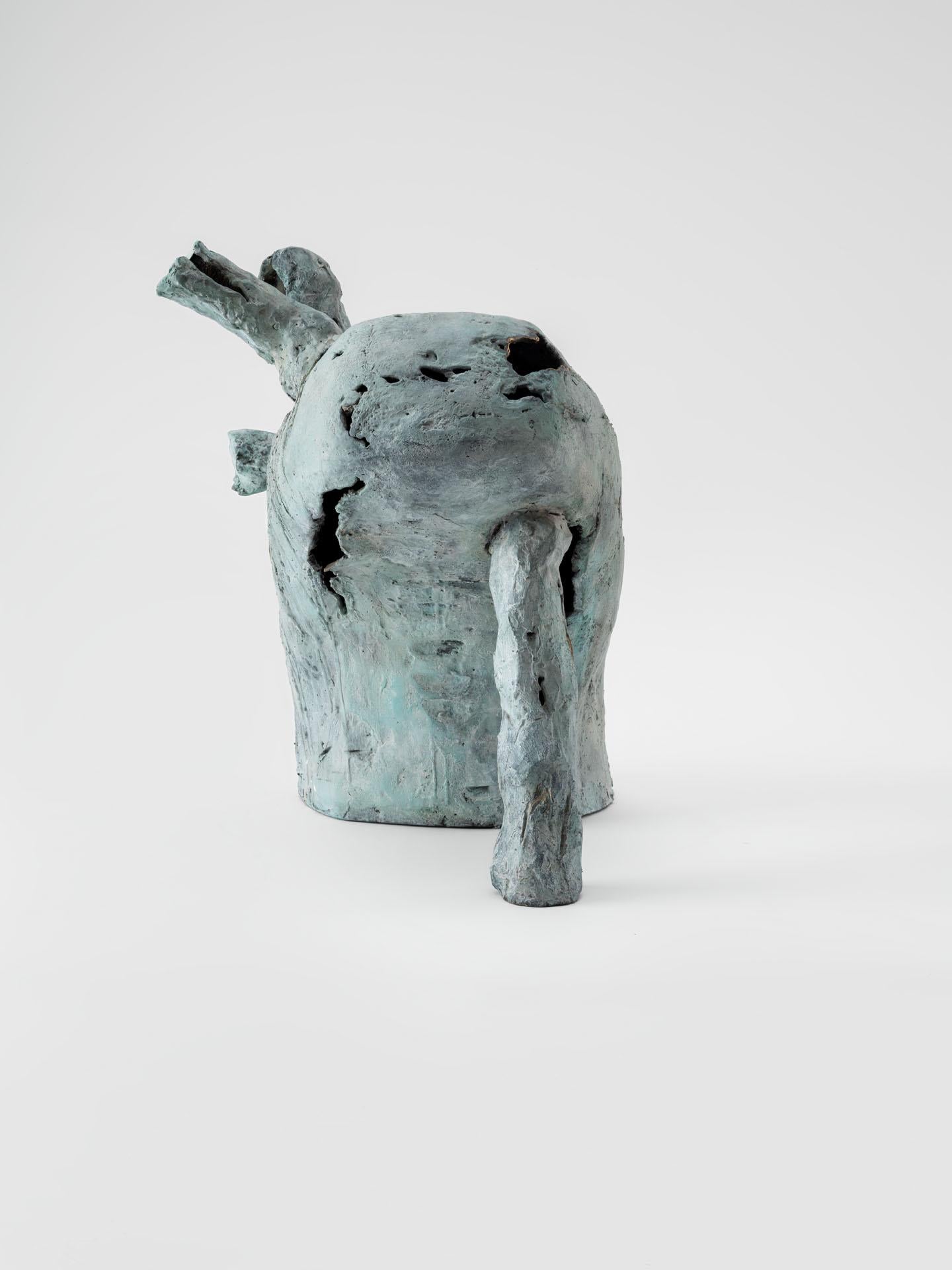 Modern The leaning outcast, contemporary sculpure in cast bronze, white-green patina For Sale